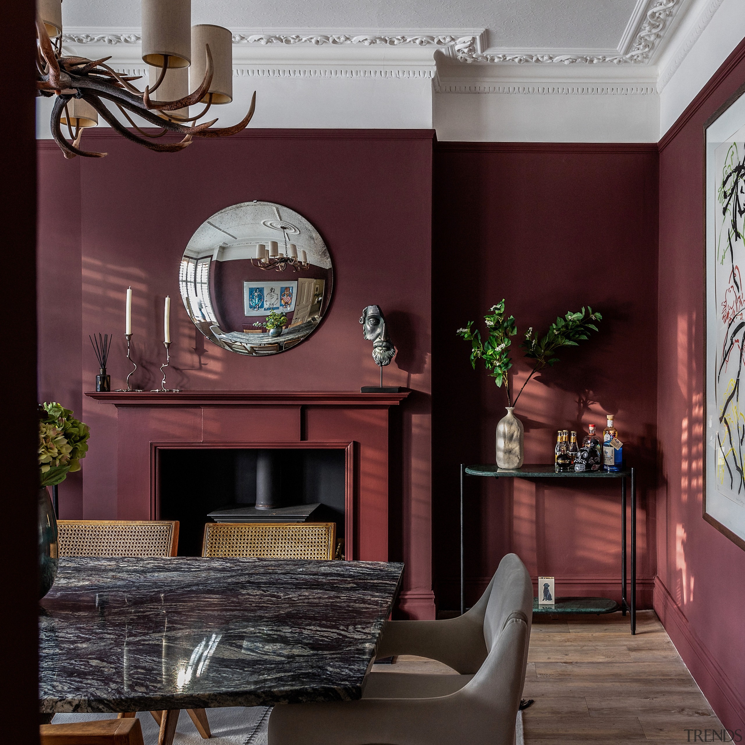 The rich-red dining room. - Eclecticism over uniformity 