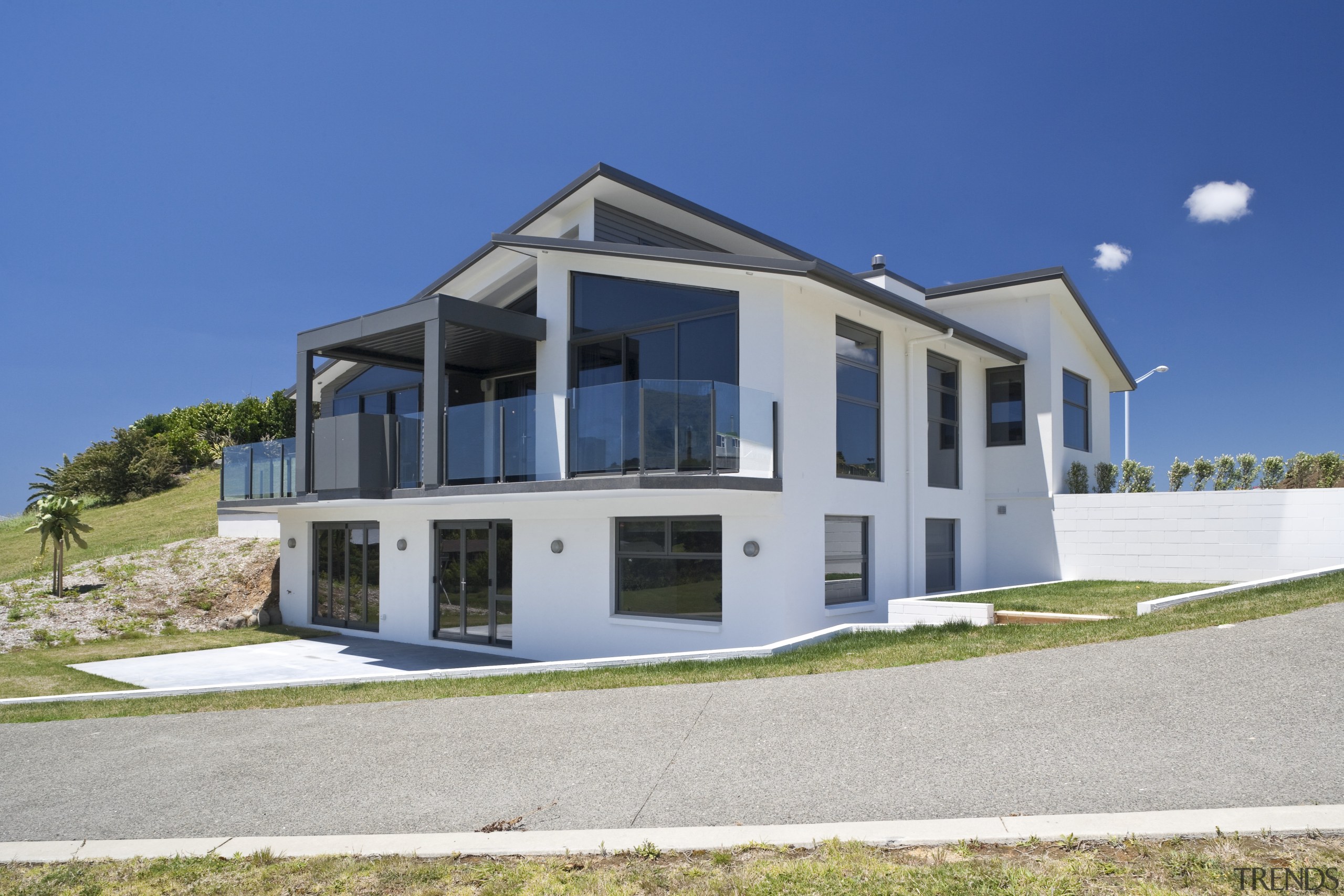 This home, by David Reid Homes Hauraki, features architecture, building, cottage, elevation, estate, facade, home, house, property, real estate, residential area, villa, blue, gray