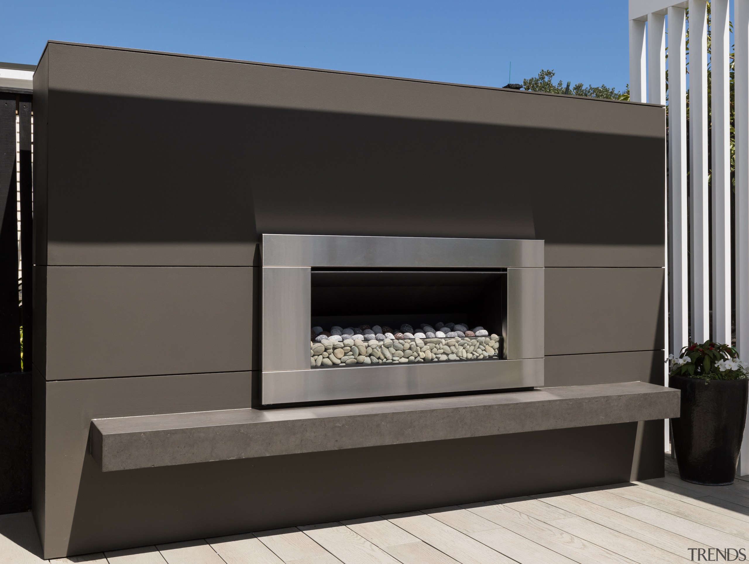 The sculptural outdoor fire surround was also created 