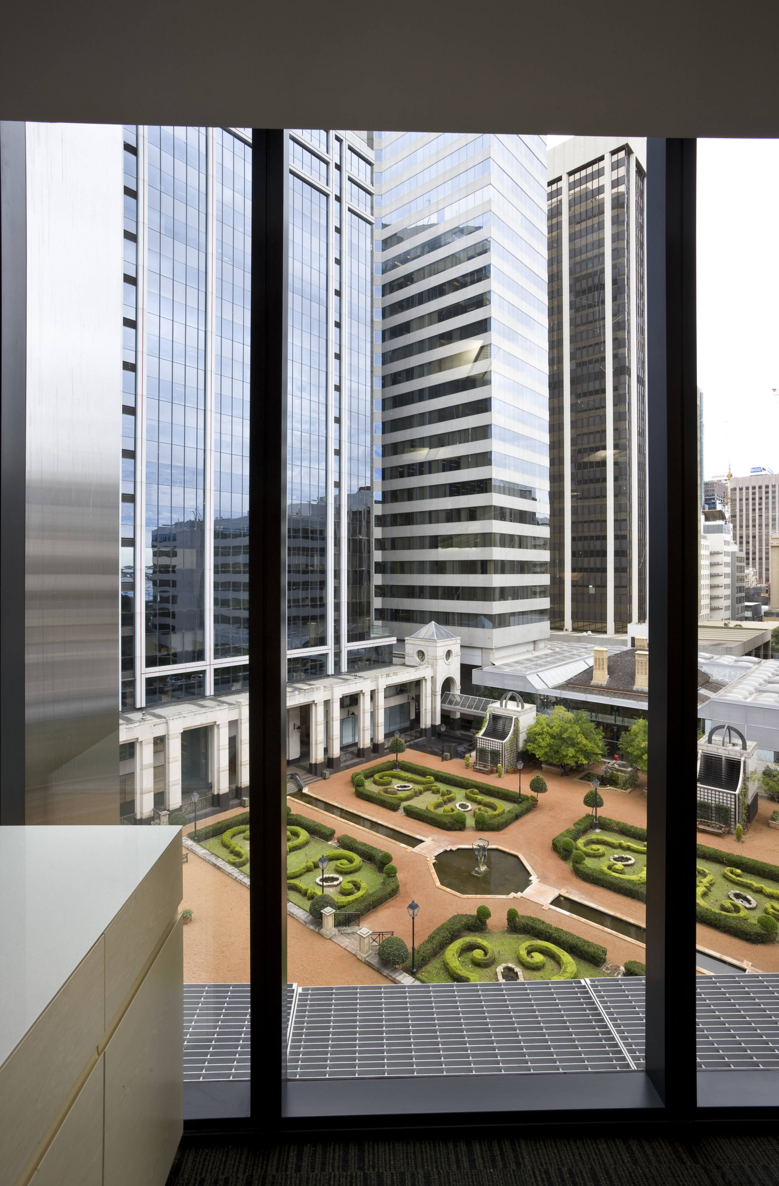 View of the Bishops See garden visable from apartment, architecture, building, commercial building, condominium, corporate headquarters, daylighting, facade, glass, mixed use, real estate, window, black, white