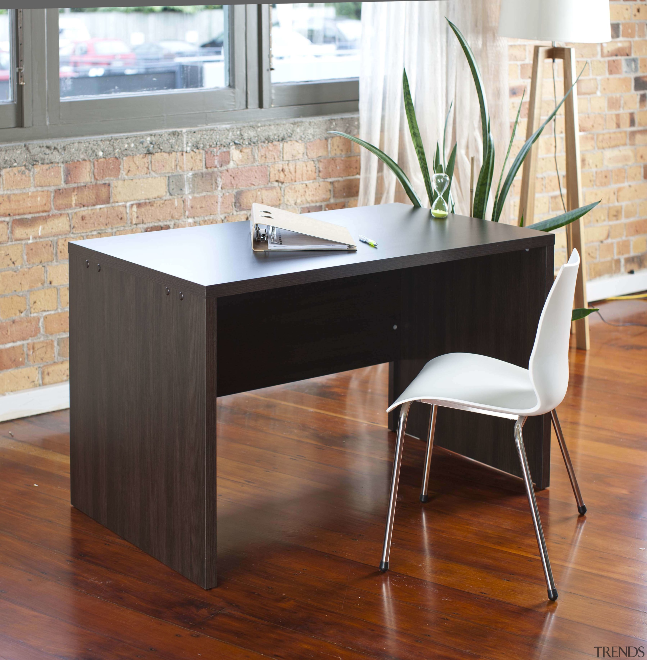 Brown wooden desk and contemporary white chair. - coffee table, desk, floor, flooring, furniture, hardwood, laminate flooring, product design, table, wood, wood flooring, wood stain, white