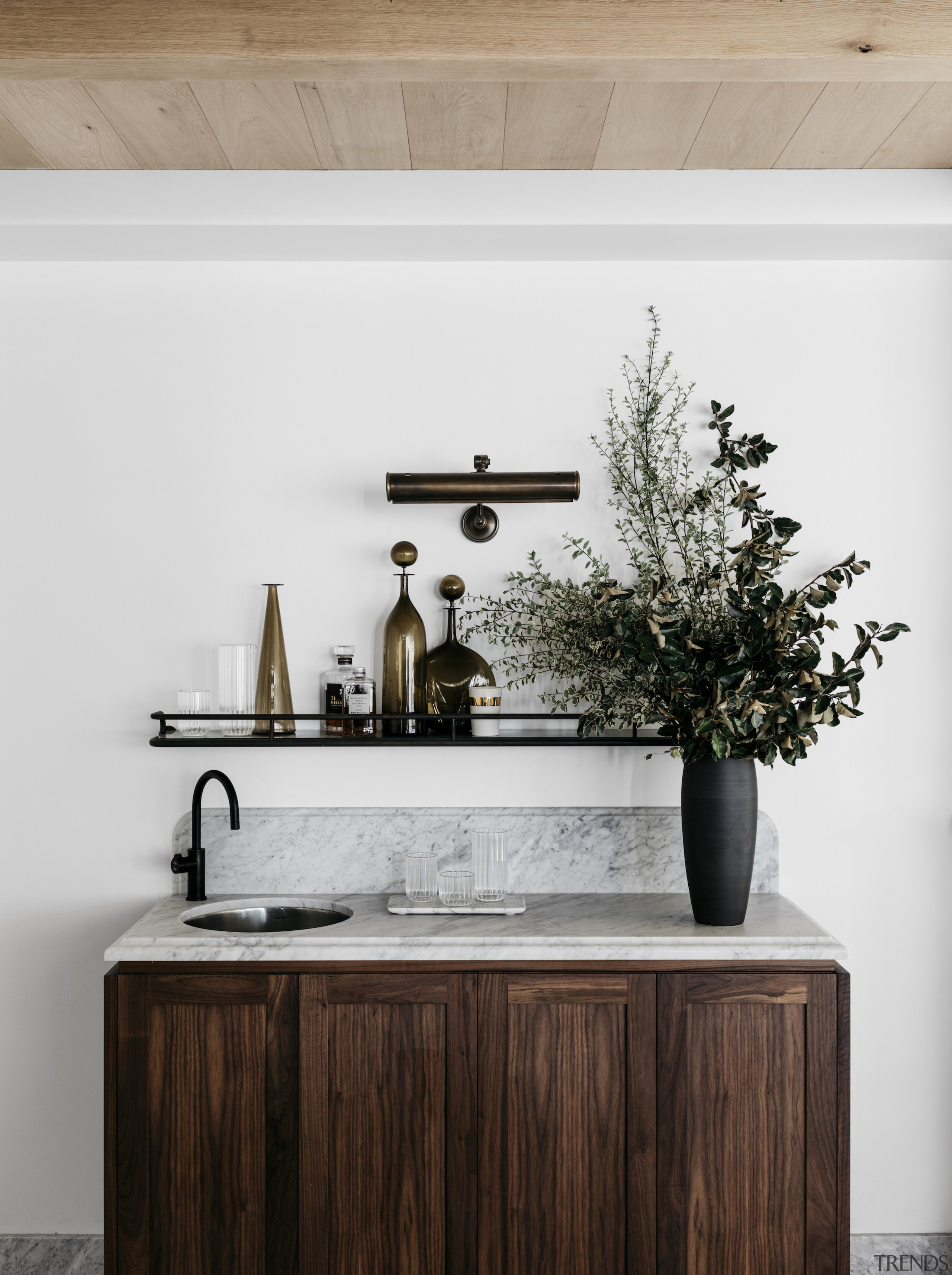 The kitchen includes its own dedicated drinks station. 