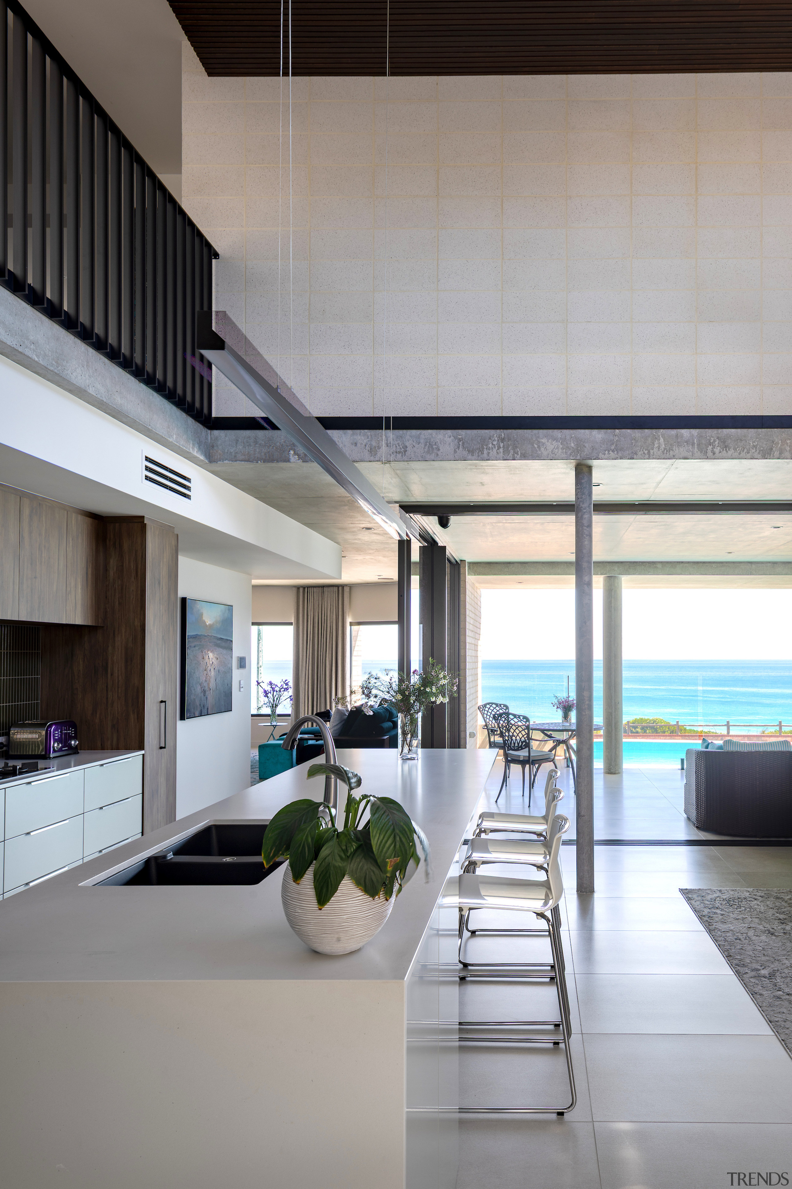 Modern kitchen island with breakfast seating. 
