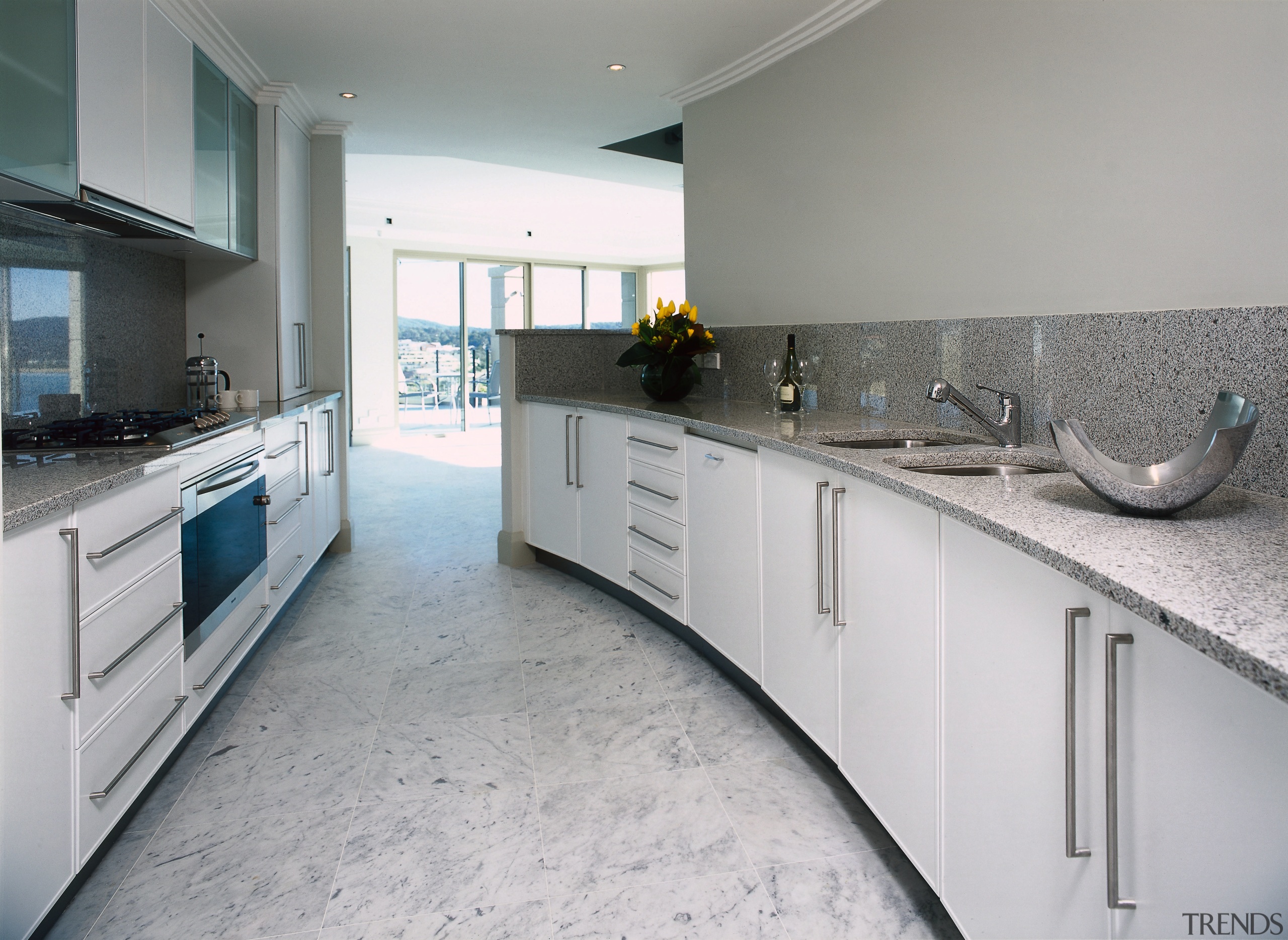interior view of the kitchen and cabinets by countertop, floor, home, interior design, kitchen, real estate, room, gray