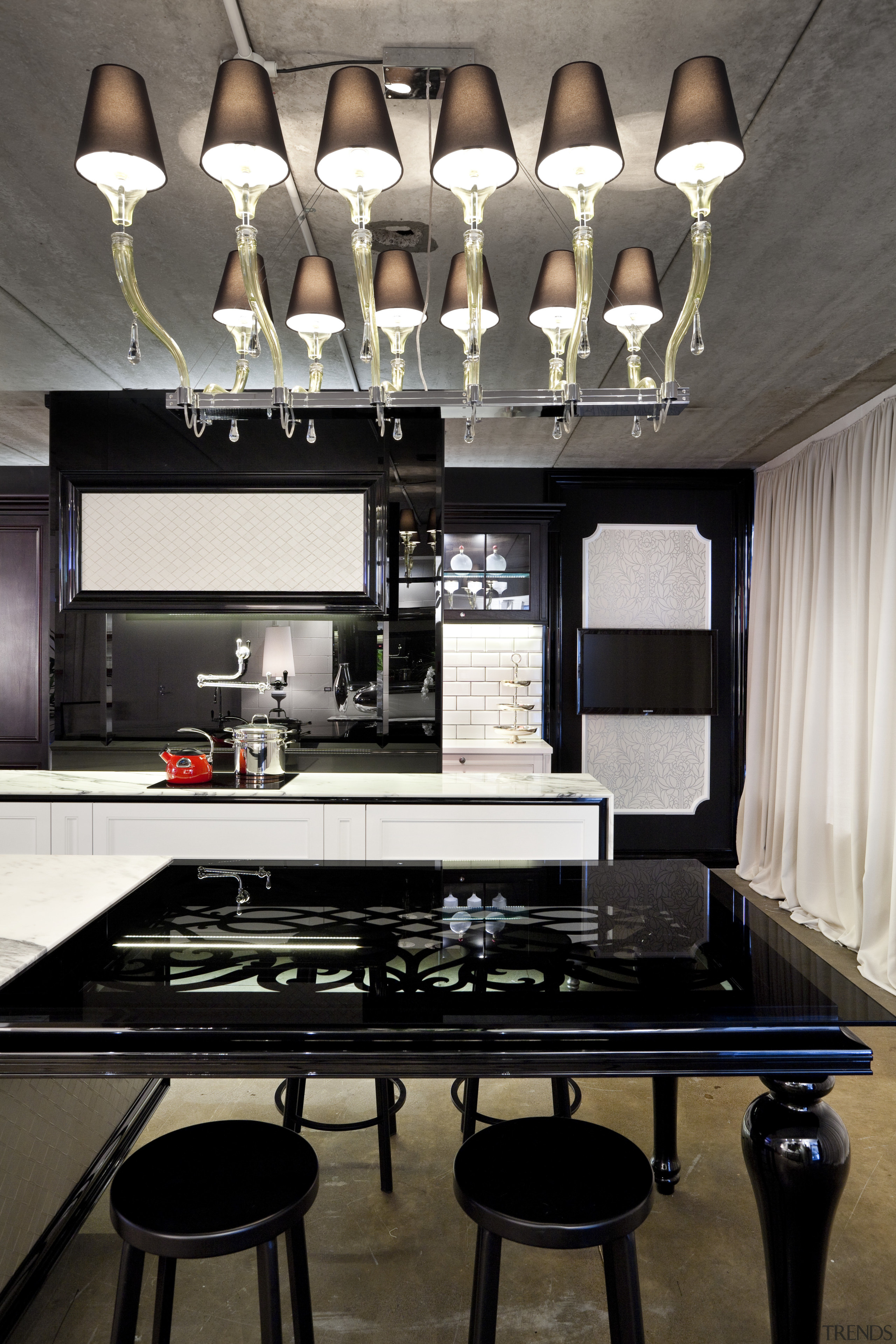 View of contemporary kitchen with lighting feature, black ceiling, countertop, interior design, kitchen, table, black