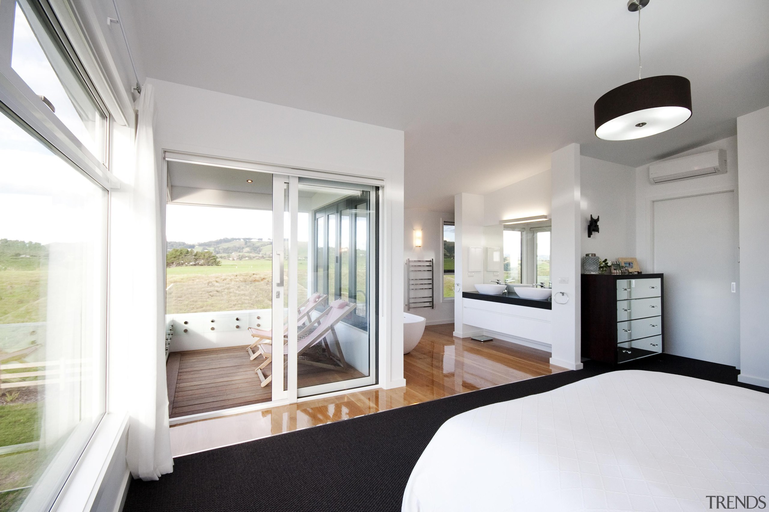 A balcony just outside of the bedroom.Built by architecture, bedroom, daylighting, home, house, interior design, property, real estate, room, window, white