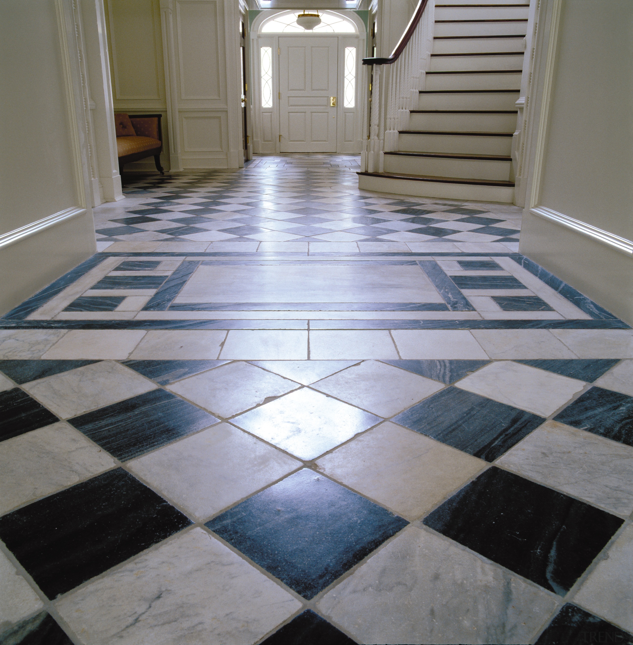 A view of this marble black and white daylighting, floor, flooring, hardwood, tile, gray