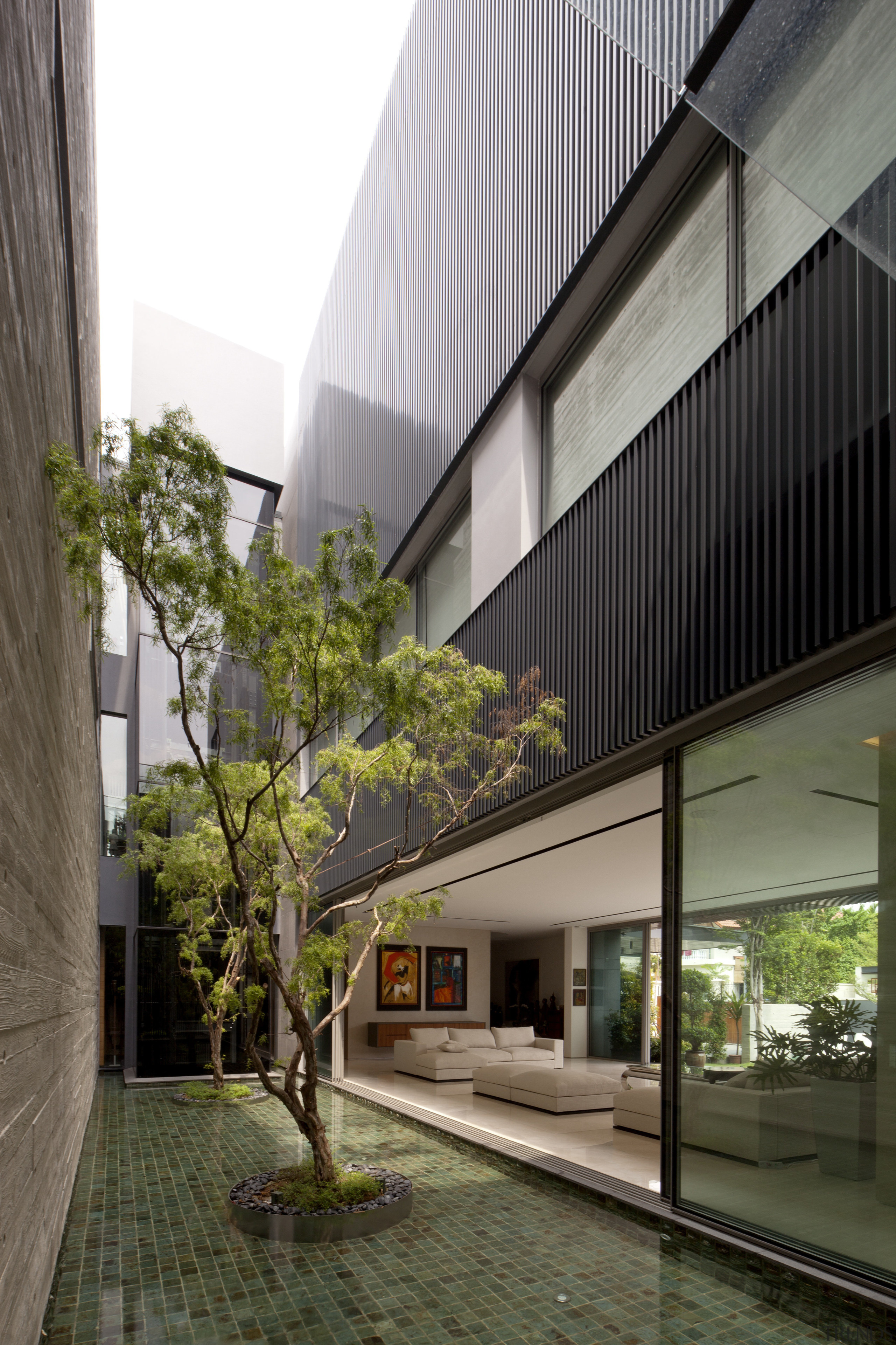 The living area on the ground floor of apartment, architecture, building, condominium, courtyard, facade, home, house, mixed use, real estate, residential area, brown