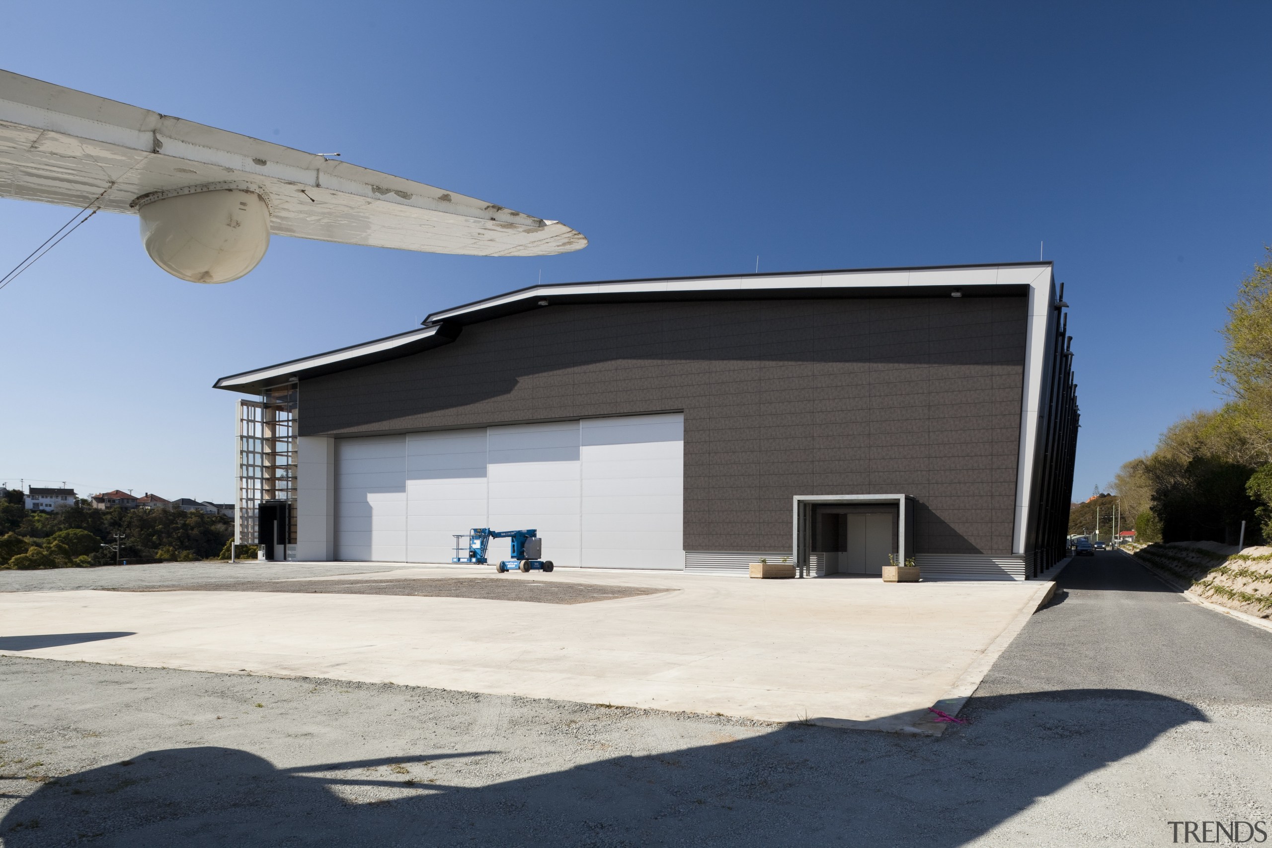 Here is a view of MOTAT's Arviation Display architecture, home, house, property, real estate, sky