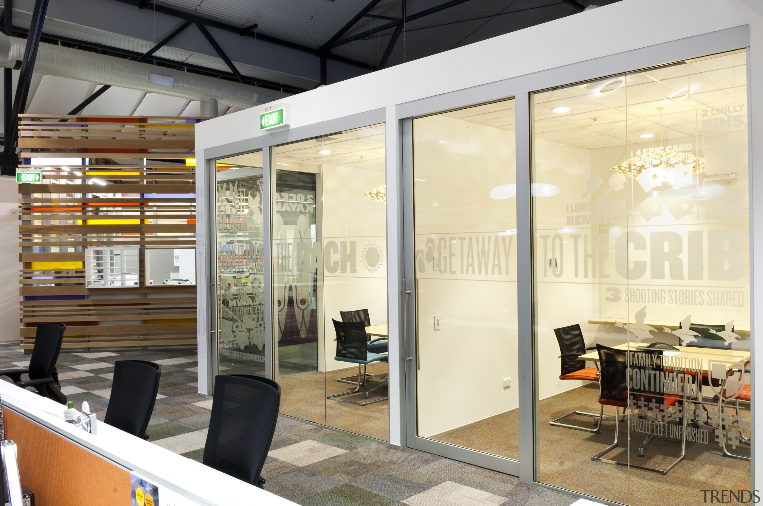 View of meeting room separated by glass wall. interior design, yellow