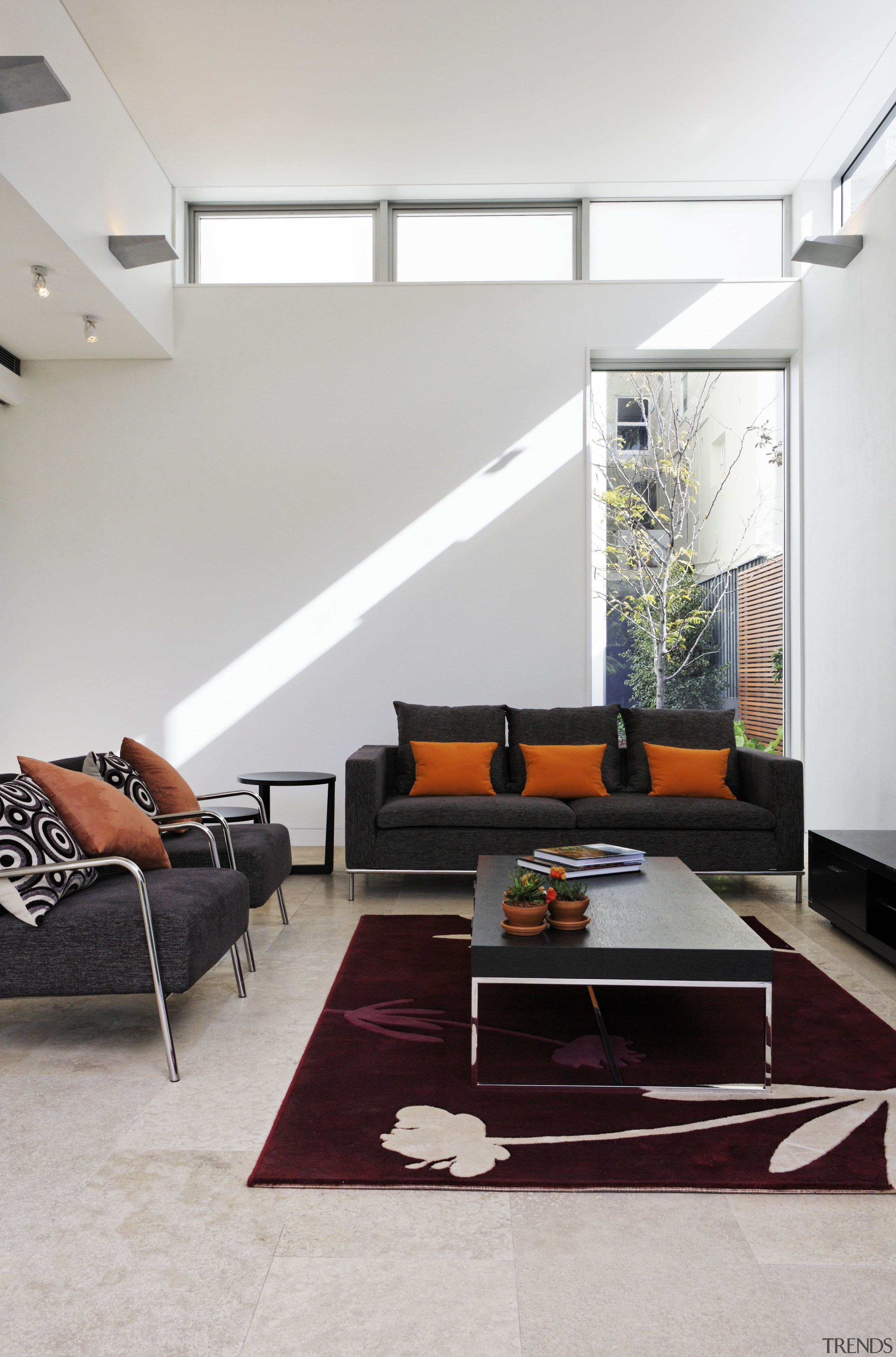 View of lounge with leather sofas, coffee table, architecture, ceiling, couch, floor, flooring, furniture, house, interior design, living room, product design, table, gray