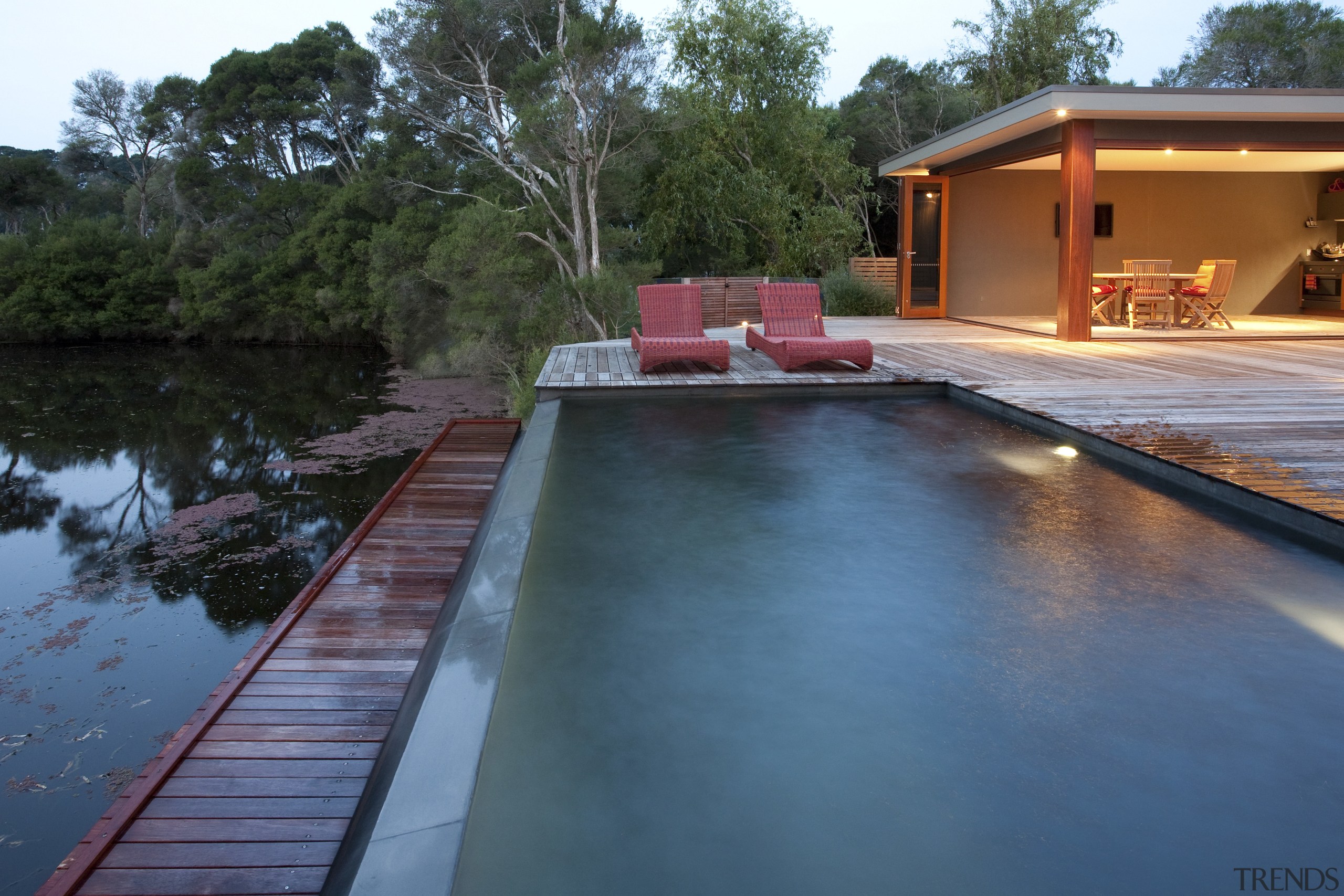 View of pool and patio area. - View backyard, estate, home, house, leisure, plant, property, real estate, reflection, resort, swimming pool, water, teal