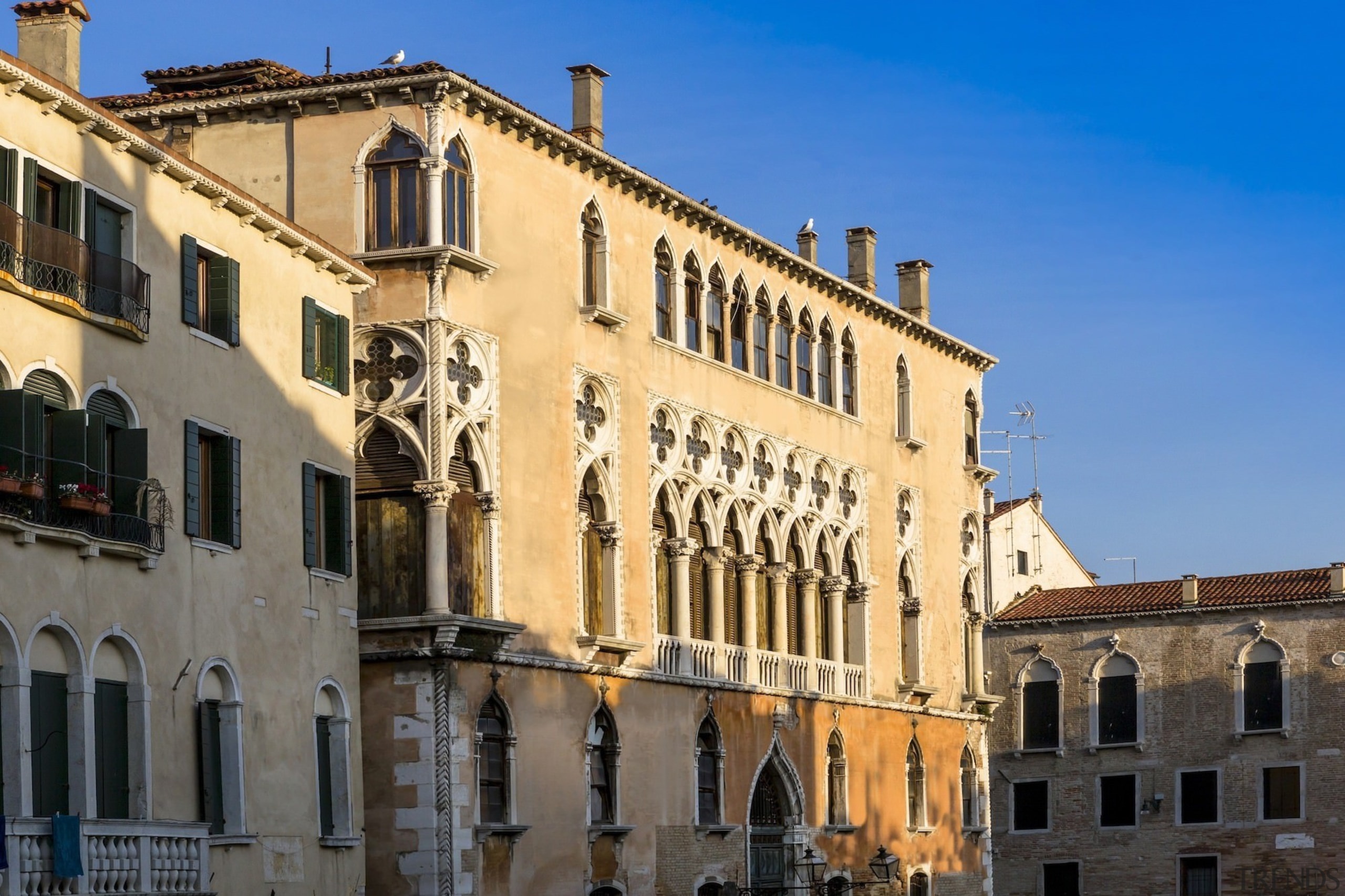 This palace was once home to Giorgione's 'The apartment, building, city, classical architecture, estate, facade, historic site, medieval architecture, metropolis, neighbourhood, palace, plaza, property, sky, town, town square, window