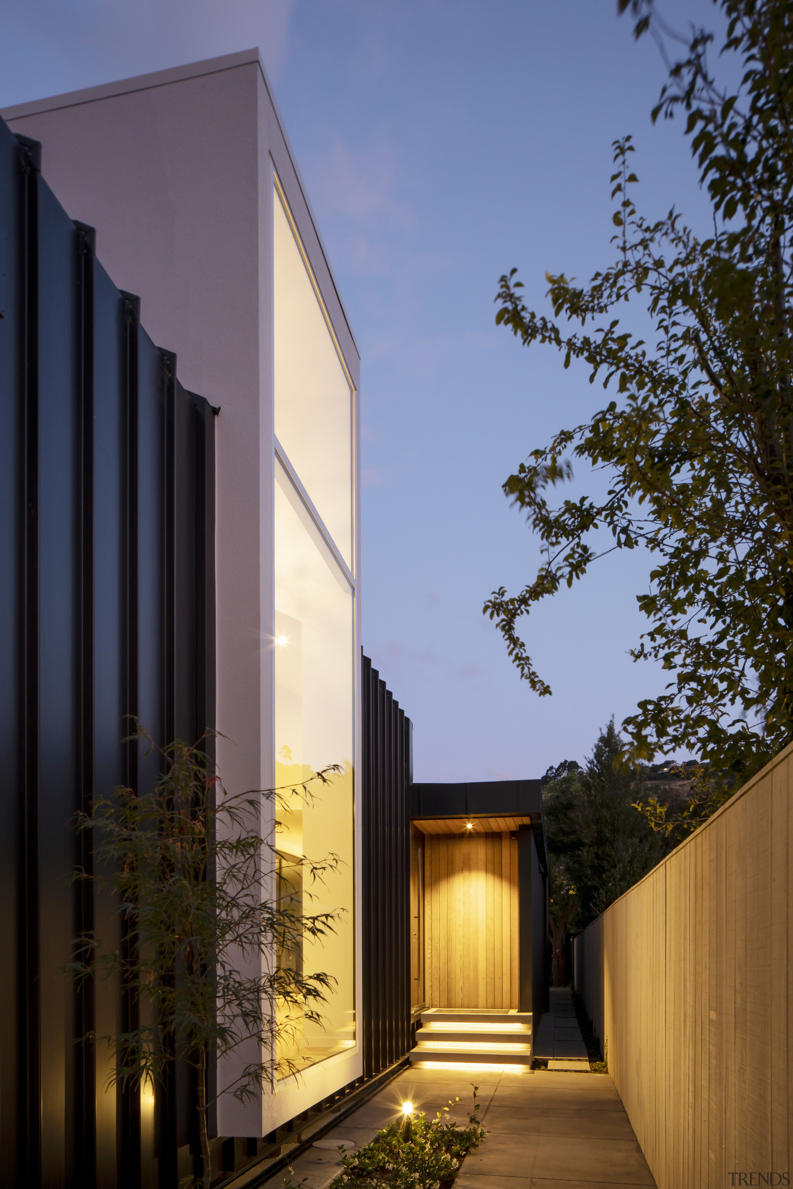 The entrance is halfway down the side of 