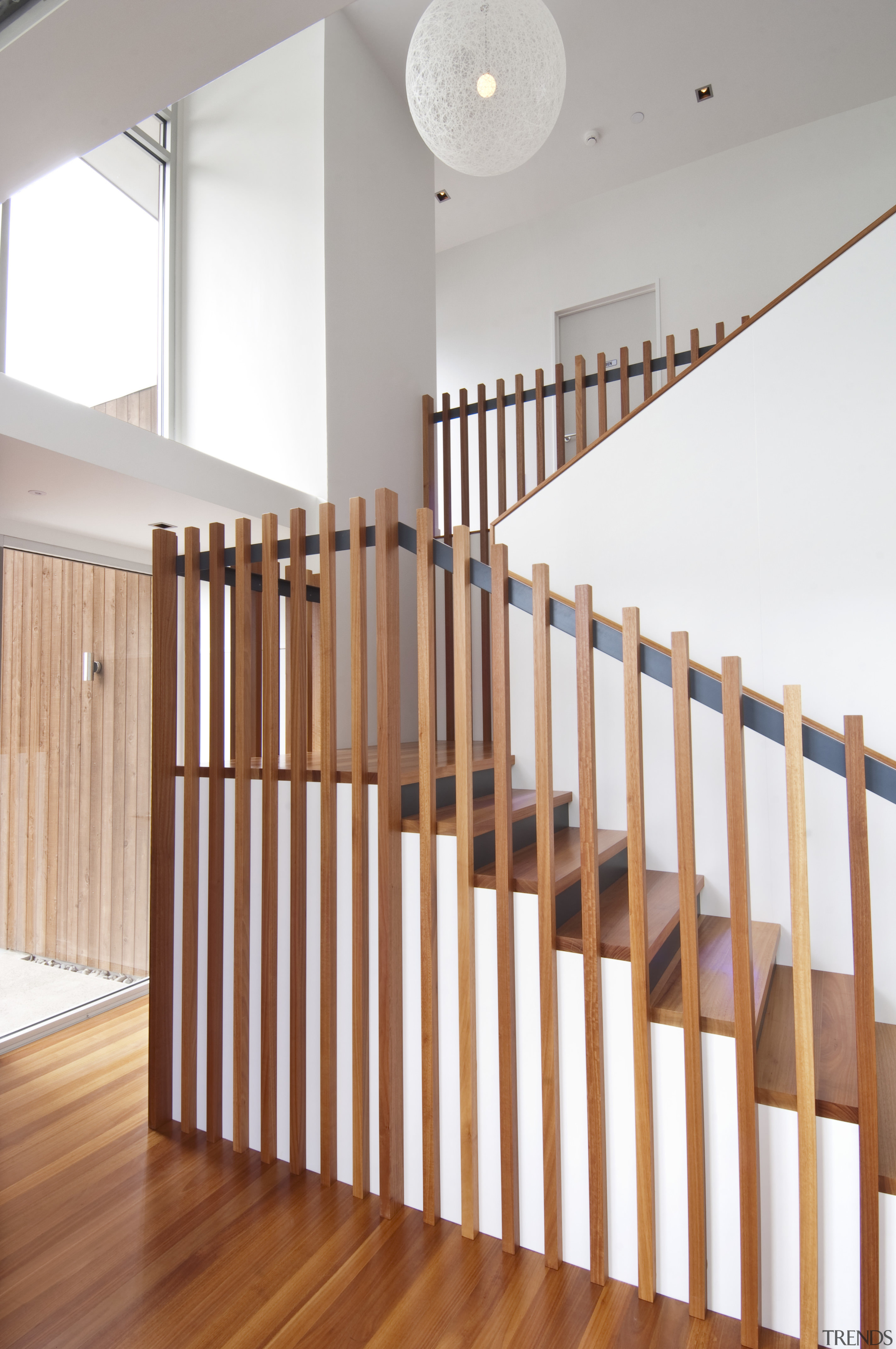 VIew of stairway in contemporary home. - VIew baluster, floor, flooring, handrail, hardwood, interior design, laminate flooring, product, stairs, wood, wood flooring, wood stain, white