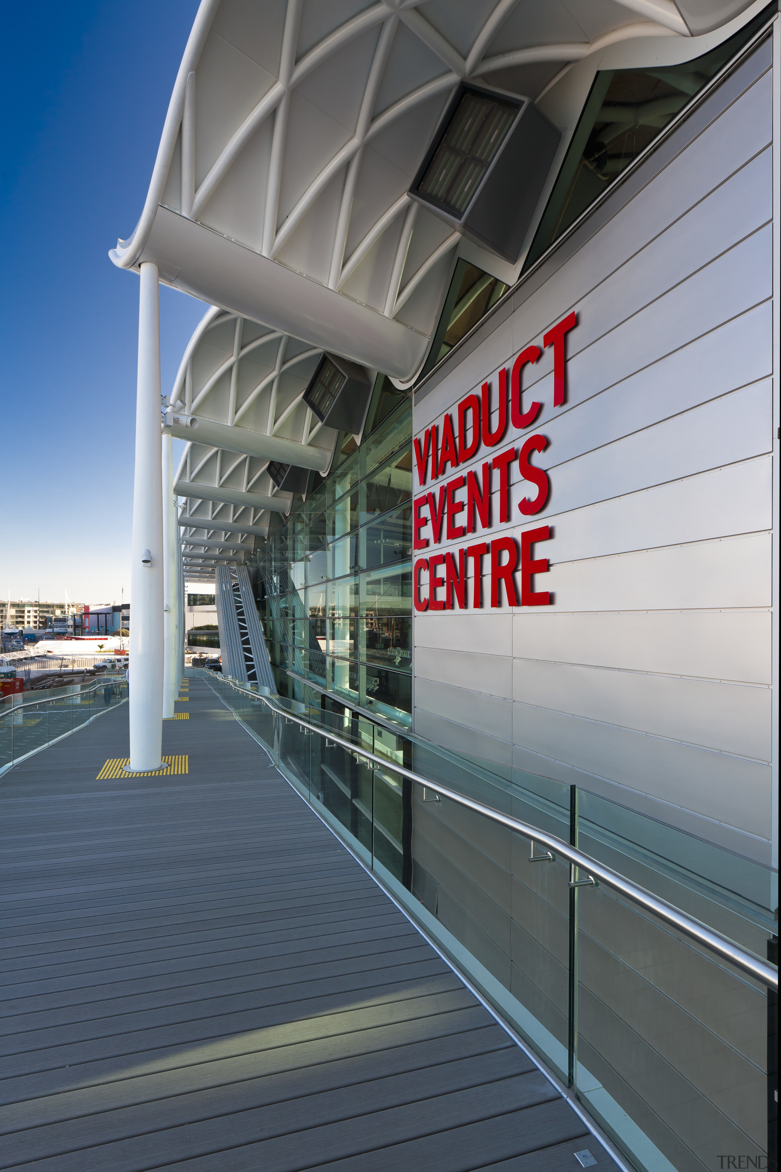 View of the Viaduct Events Center in Auckland's architecture, building, fixed link, infrastructure, line, metropolitan area, sky, sport venue, structure, gray