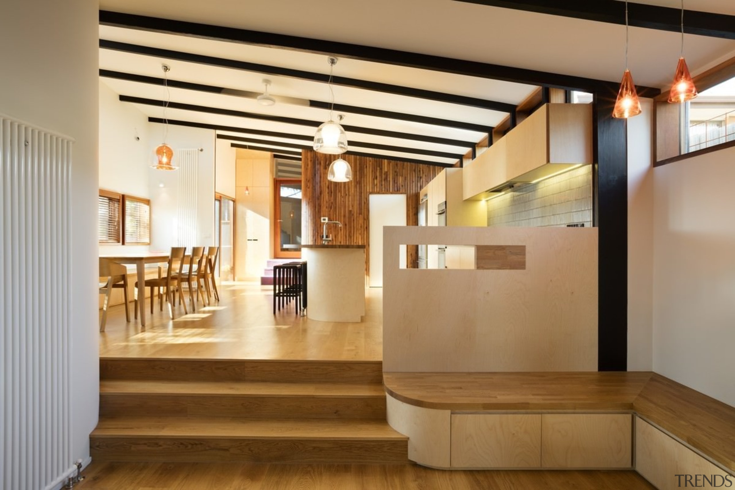 This informal seating area is ideal for impromptu ceiling, floor, flooring, interior design, lobby, wood, orange, brown