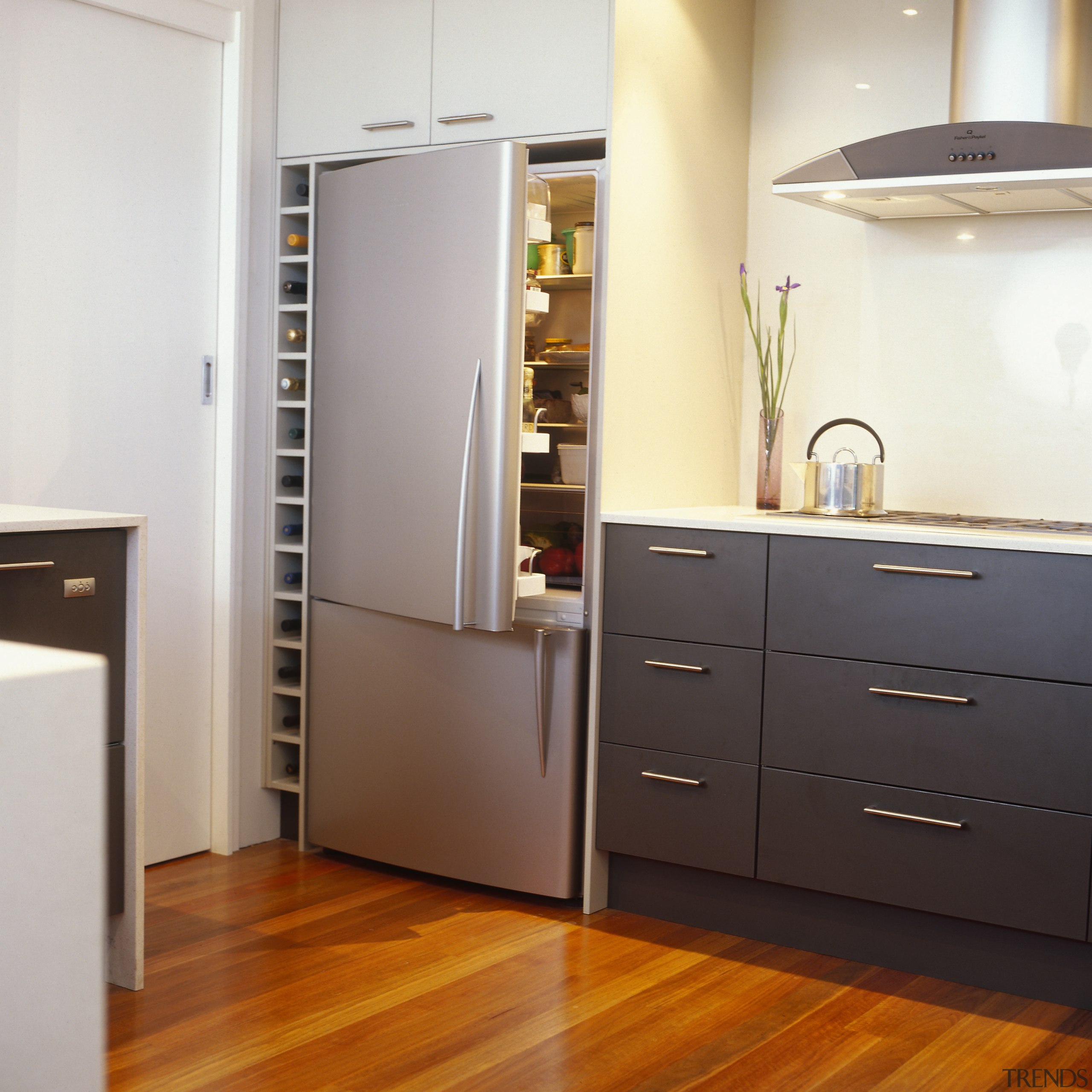 View of the Fisher &amp; Paykel Inox refrigerator cabinetry, chest of drawers, floor, flooring, furniture, hardwood, home appliance, interior design, kitchen, major appliance, refrigerator, room, gray