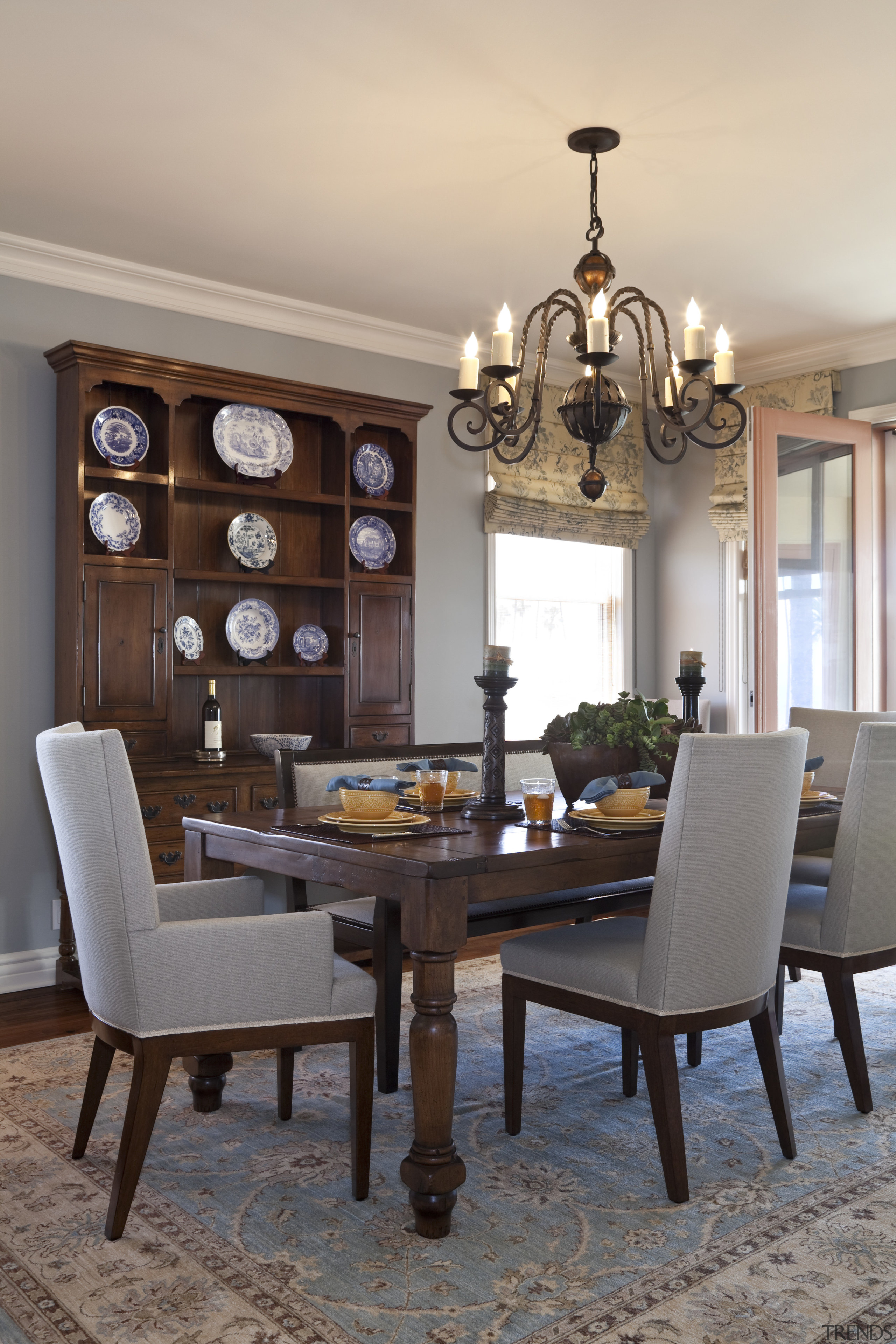 Interior view of this remodeled traditional condo by ceiling, dining room, furniture, home, interior design, living room, room, table, gray