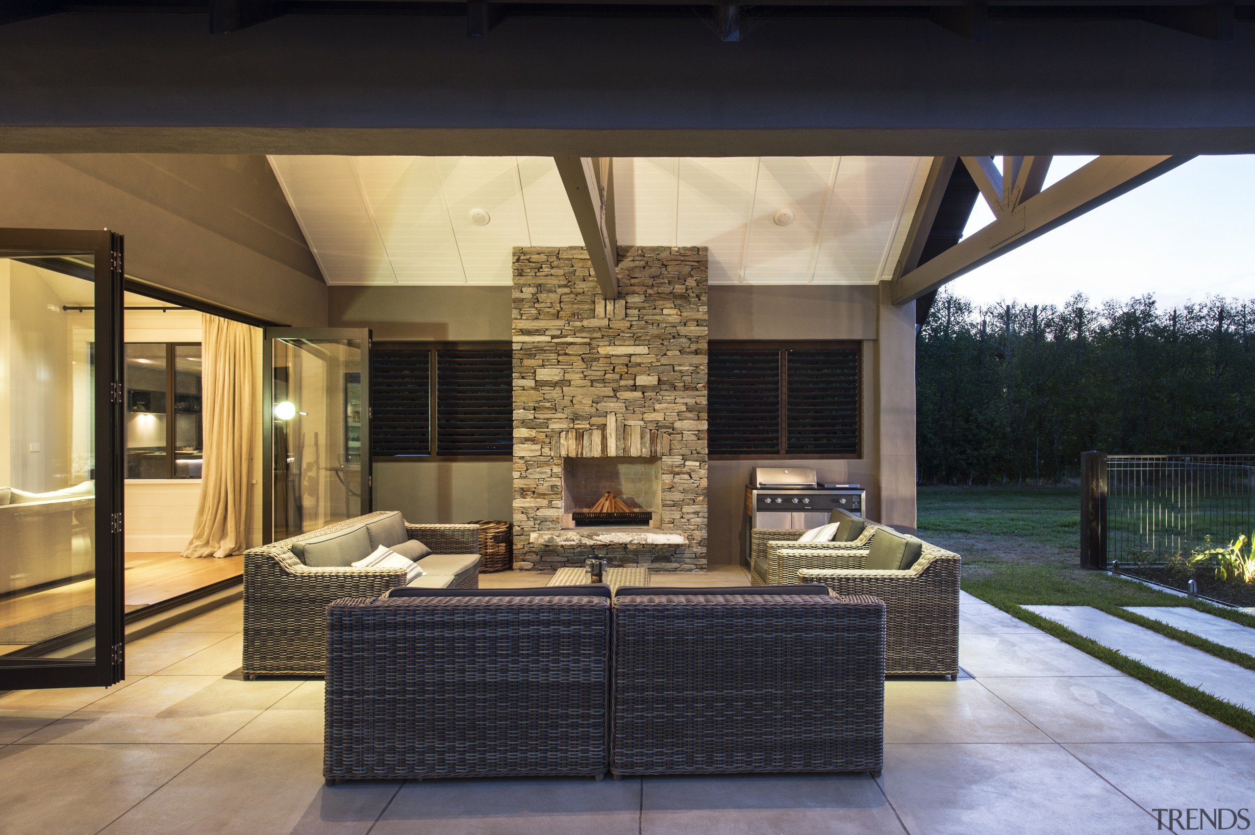 This contemporary, well-balanced masonry home was designed and estate, home, house, interior design, lighting, living room, outdoor structure, patio, property, real estate, black