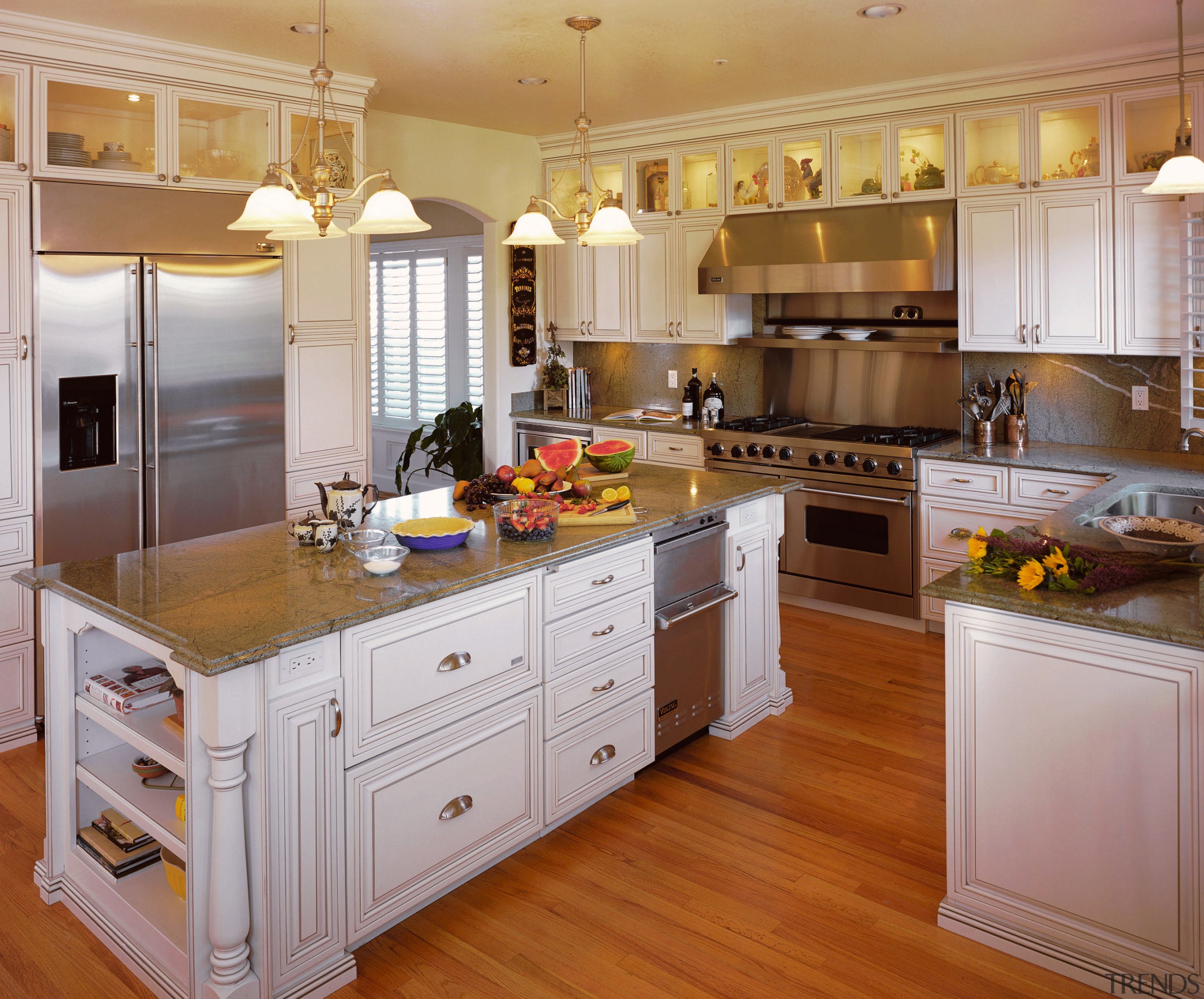 A view of some kitchen cabinetry made by cabinetry, countertop, cuisine classique, floor, flooring, hardwood, interior design, kitchen, room, wood flooring, gray, brown