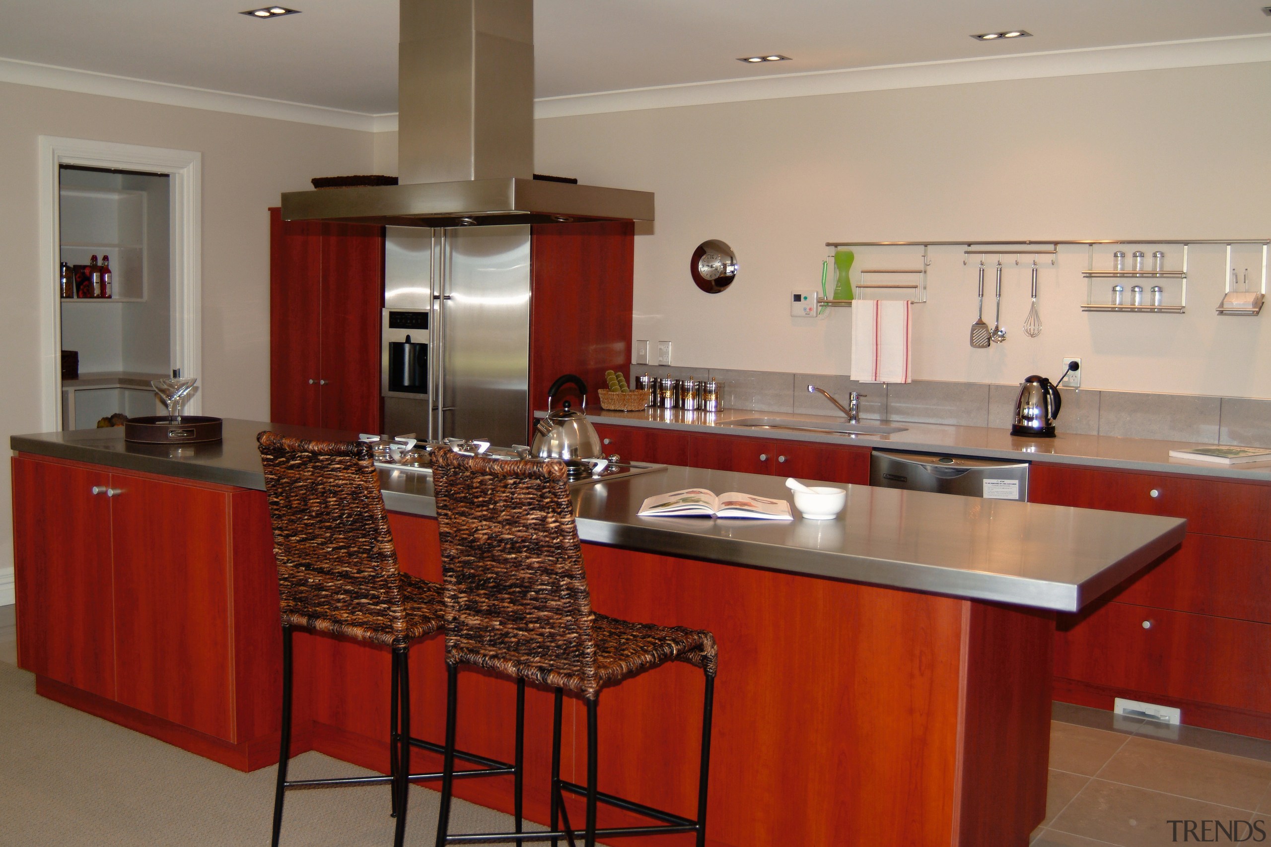 view of the kitchen showing smeg stainless steel cabinetry, countertop, cuisine classique, flooring, interior design, kitchen, property, real estate, room, red