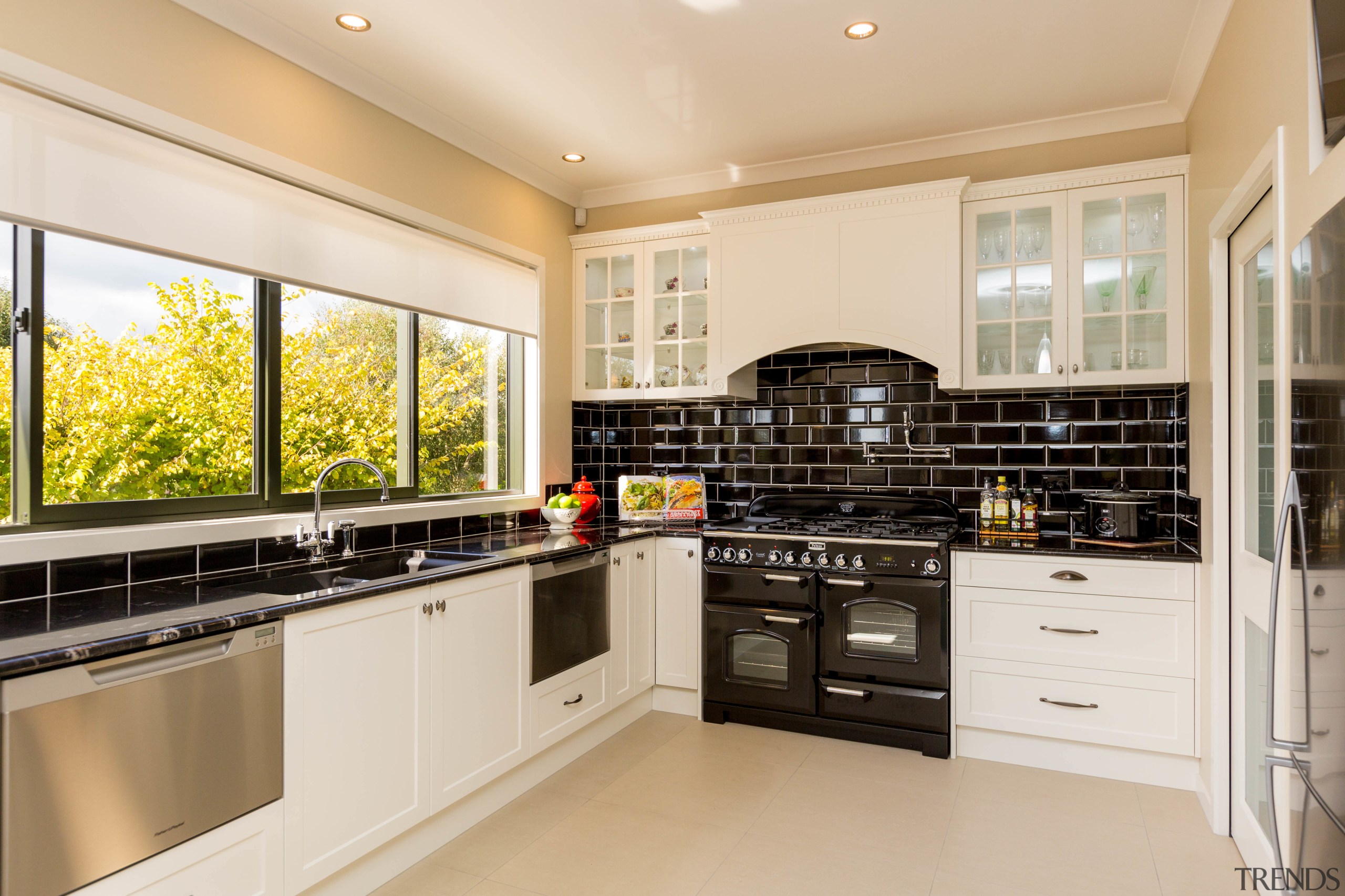 This kitchen exudes old-fashioned charm, from the freestanding cabinetry, countertop, cuisine classique, interior design, kitchen, property, real estate, room, white