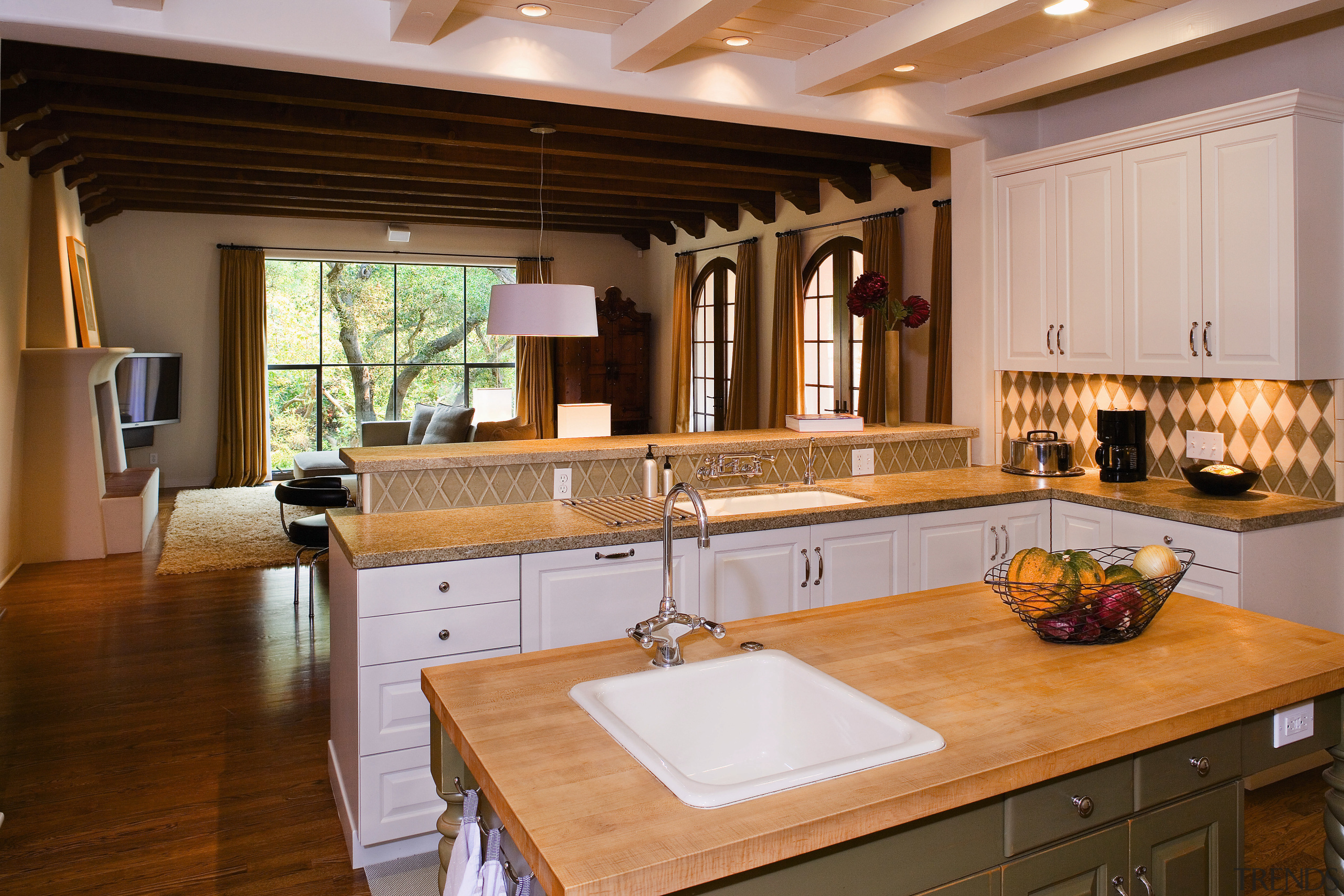 Moroccan-style tile patterns are repeated throughout the house. countertop, cuisine classique, estate, interior design, kitchen, real estate, brown, gray