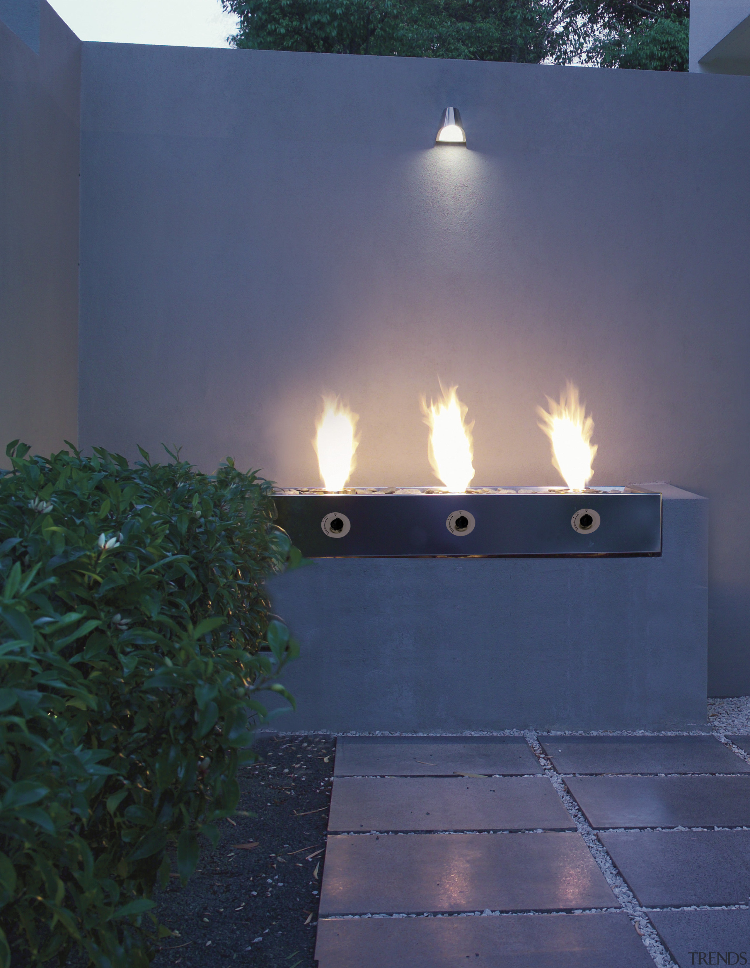 view of outdoor fireplace from Real Fires. - heat, light, lighting, sunlight, wall, water, blue