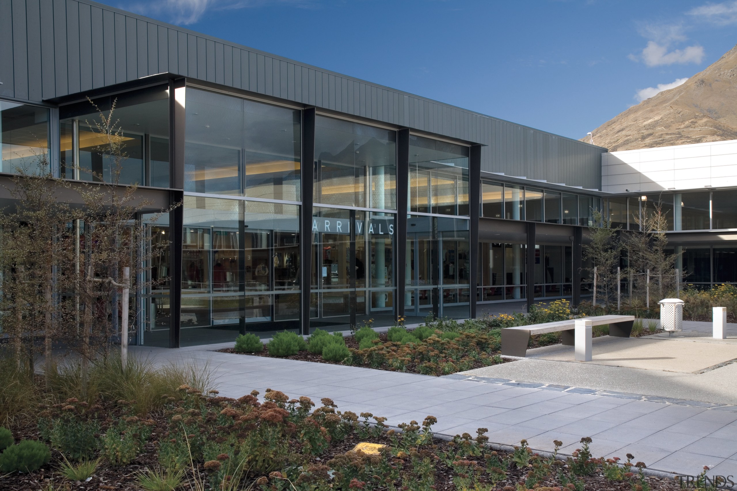 A view of the Queenstown Airport designed by architecture, building, commercial building, corporate headquarters, facade, headquarters, house, mixed use, real estate, black, gray