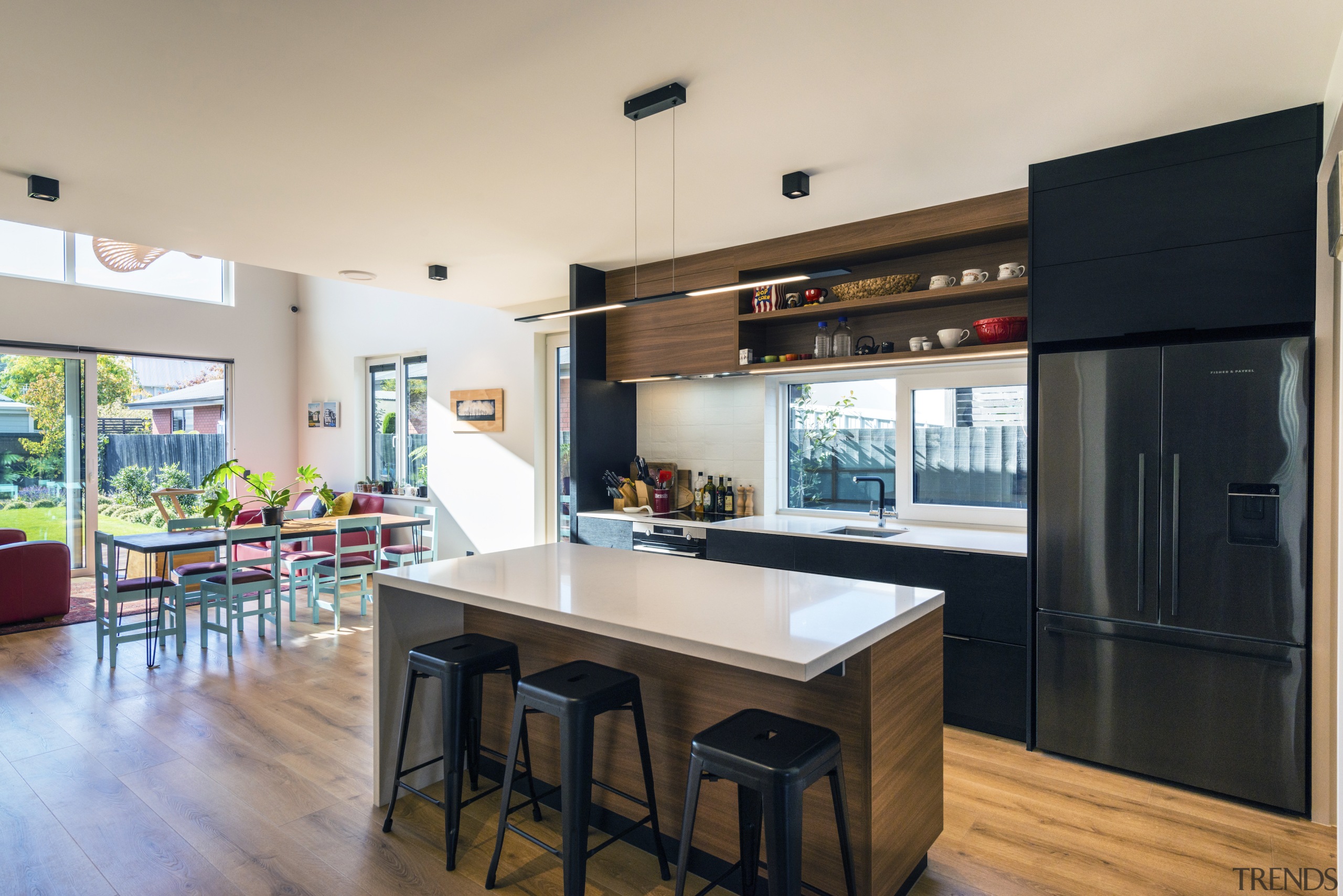 The kitchen continues the two-tone look of the 