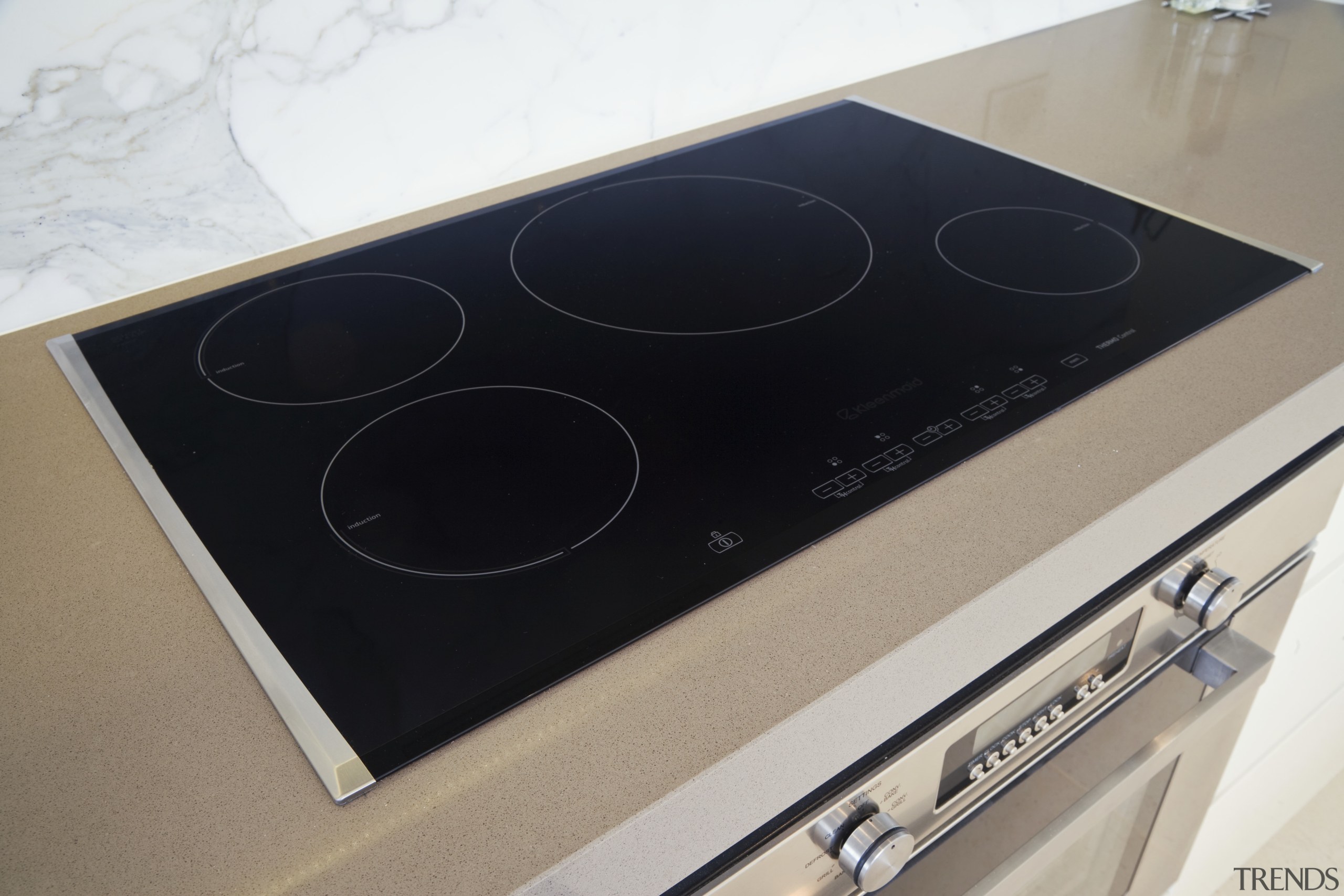 Image of the Induction Cooktop which cooks by cooktop, electronics, product design, black, gray