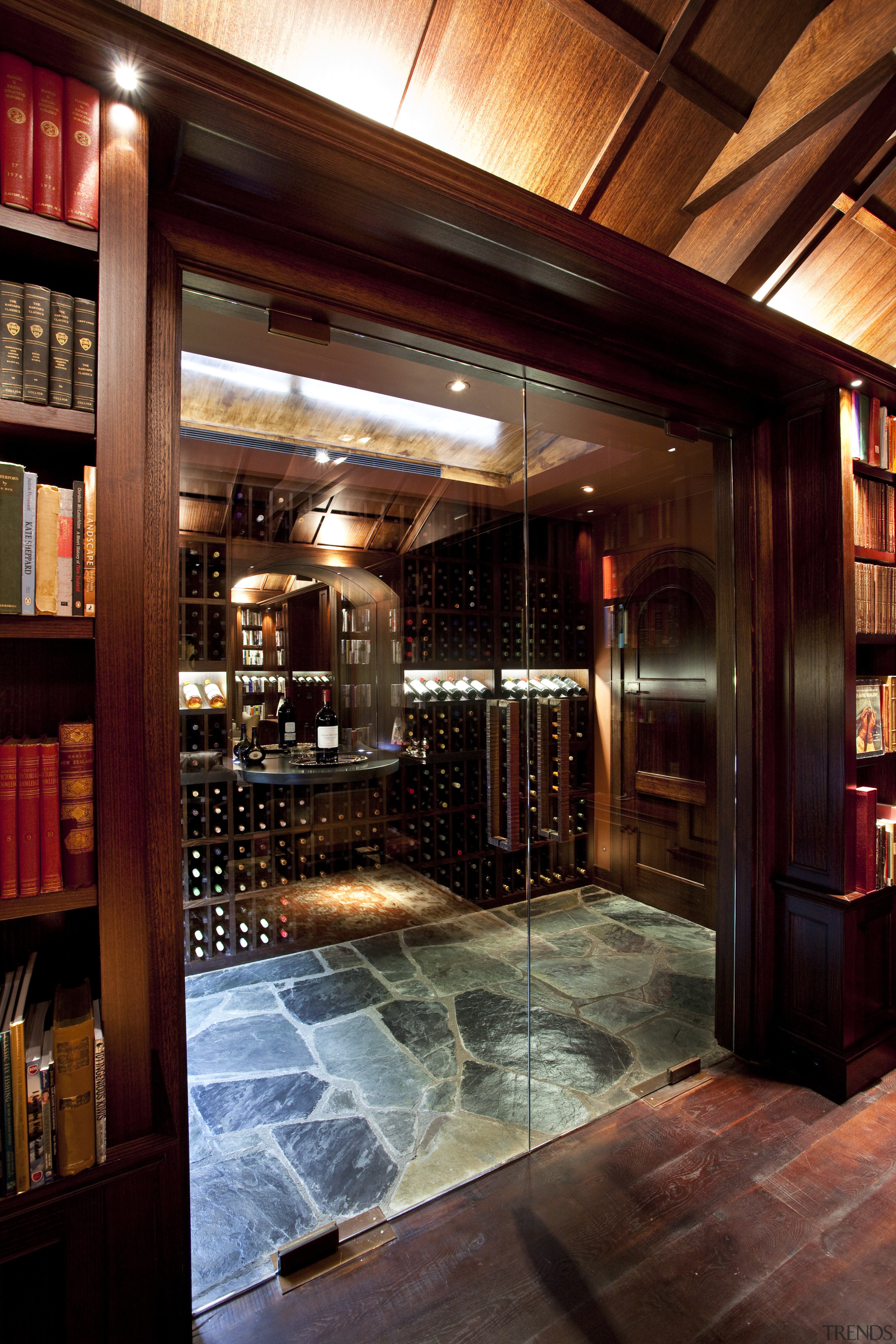 View of doorway between wine storage area and interior design, lobby, restaurant, wood, red