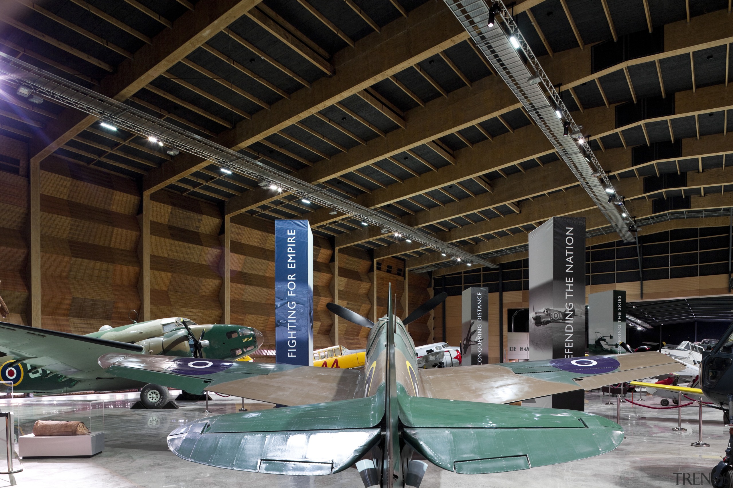 The timber for this MOTAT Aviation Display Hall aerospace engineering, airplane, aviation, daylighting, hangar, tourist attraction, brown, black