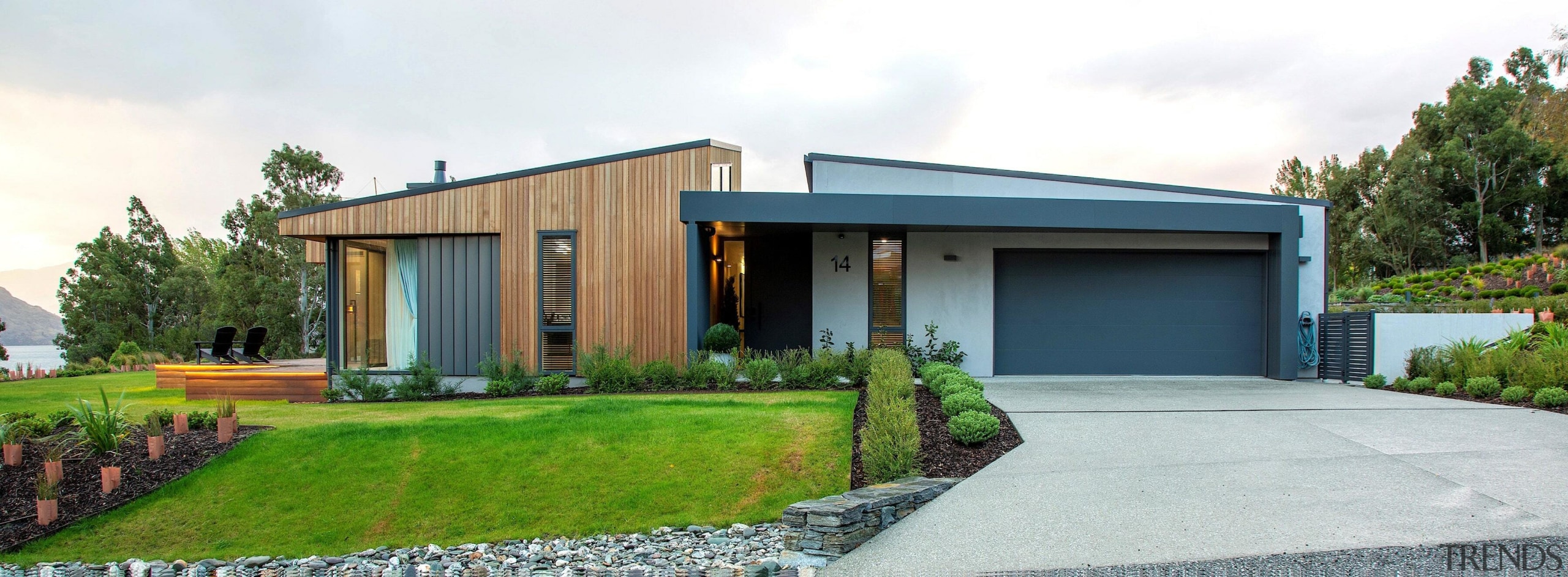 The front door and driveway at the side 