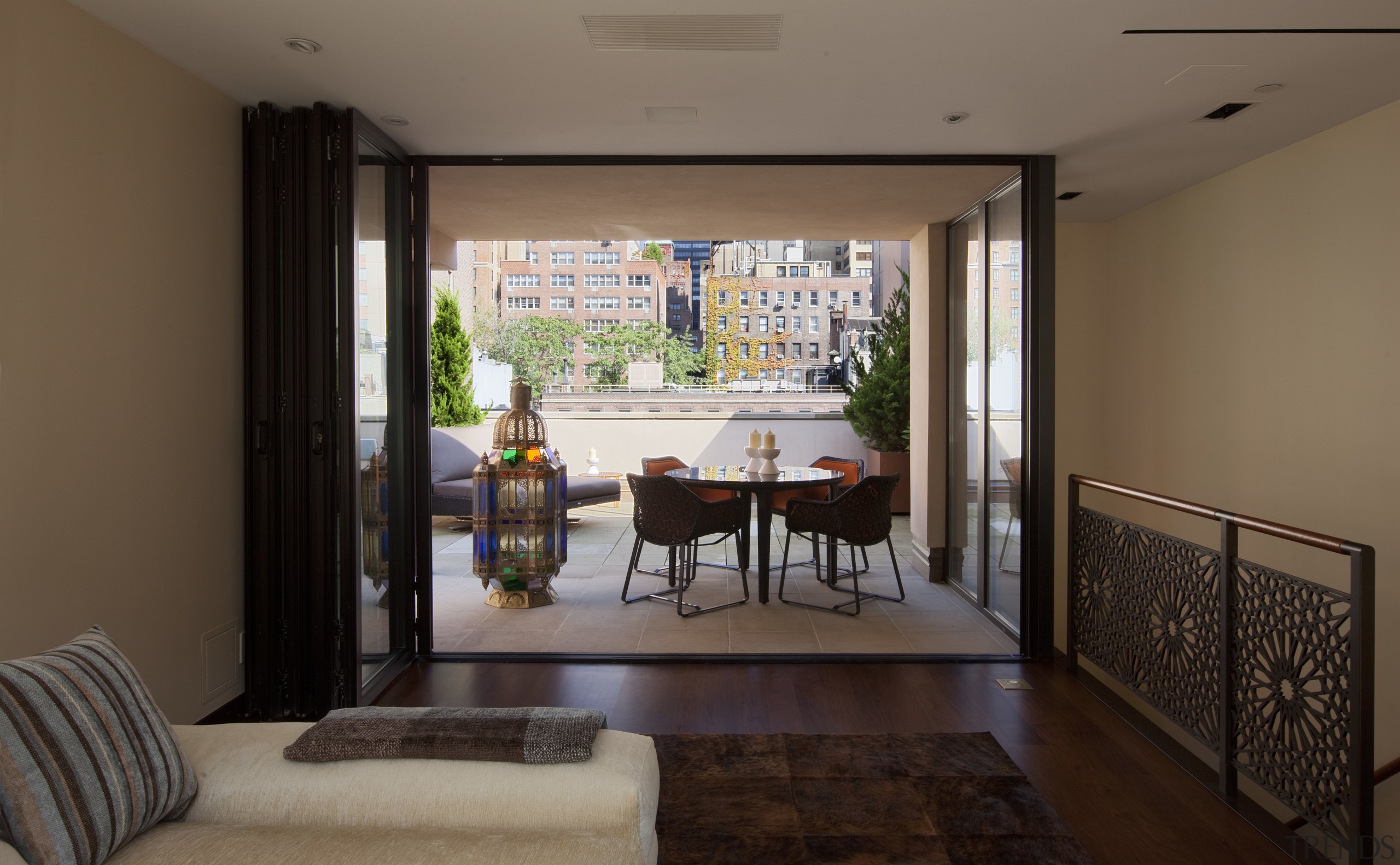 Room with wooden flooring leading out to patio apartment, door, house, interior design, living room, property, real estate, room, window, brown, black