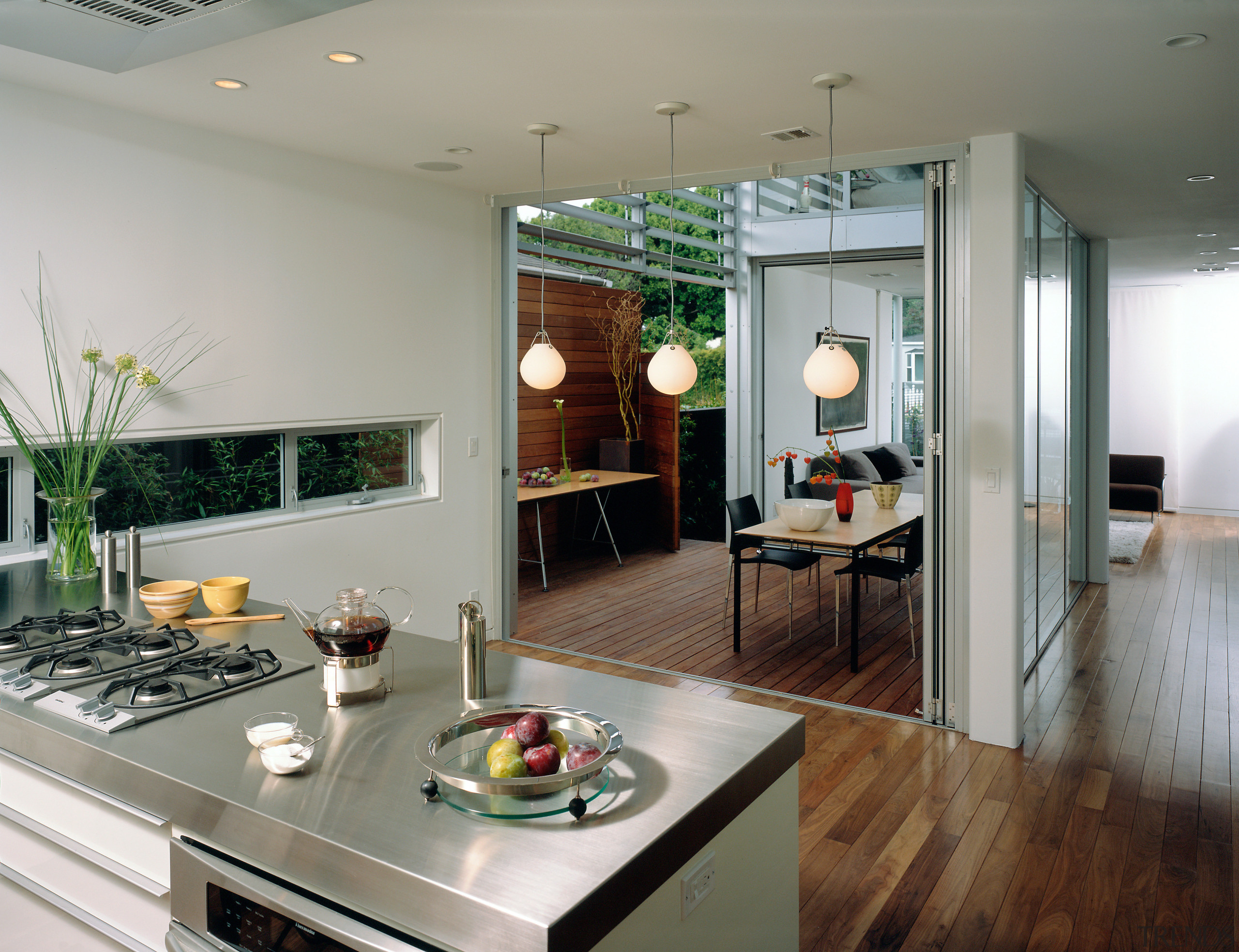A view of the kitchen featuring stainless steel countertop, interior design, kitchen, gray