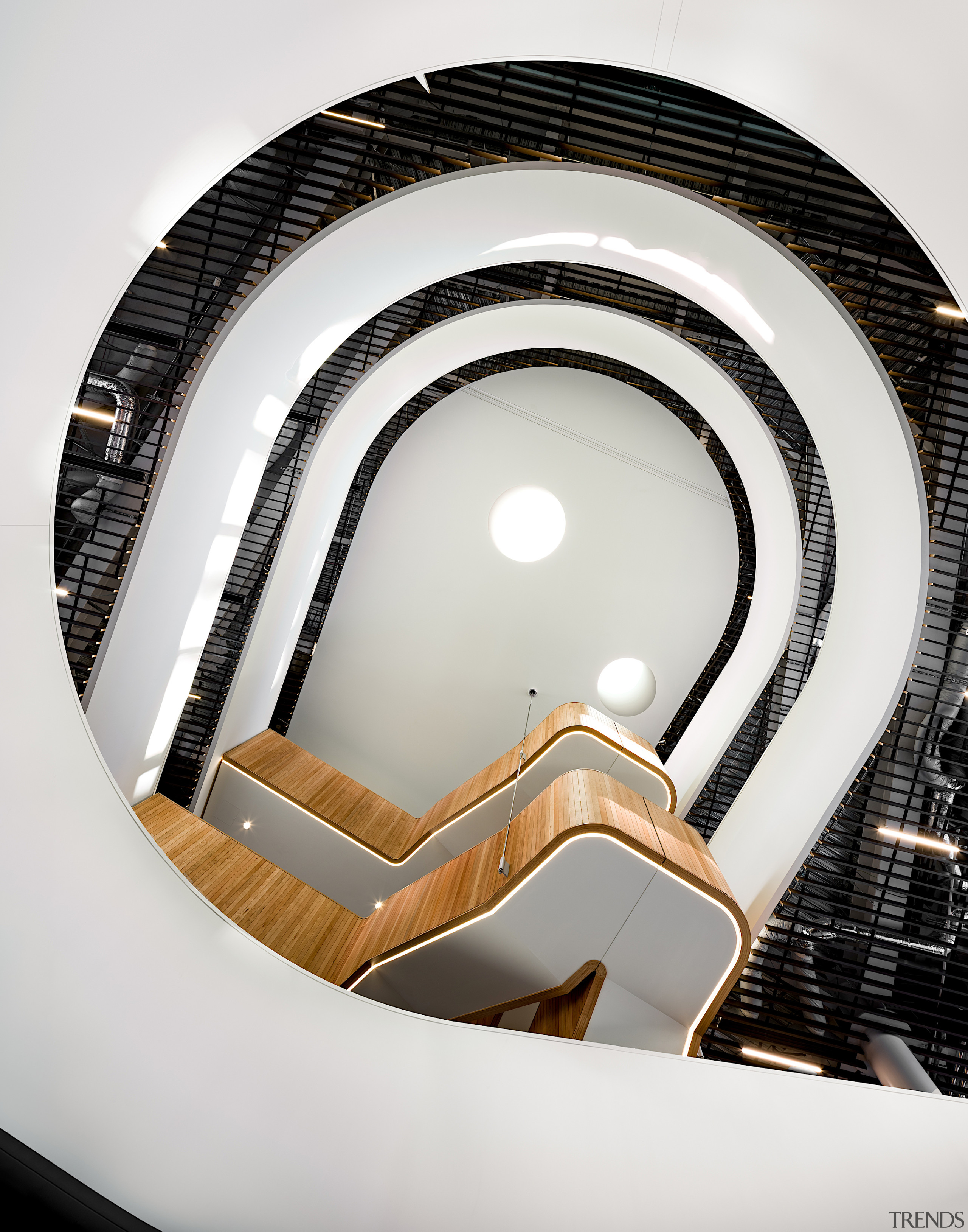 The circulation stair hangs out over the atrium 