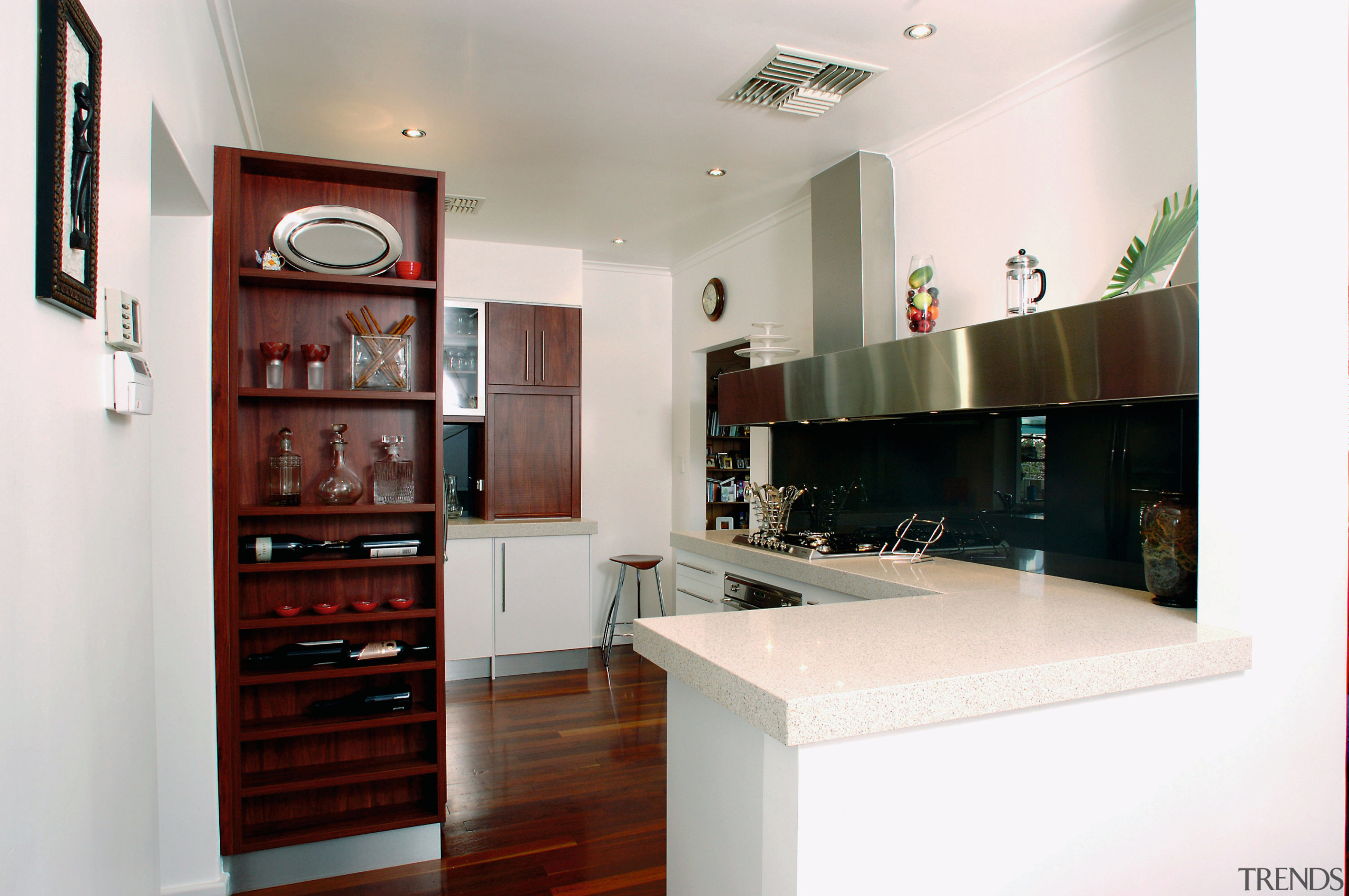 view of this modern kitchen featuring polished timber countertop, interior design, kitchen, real estate, room, white