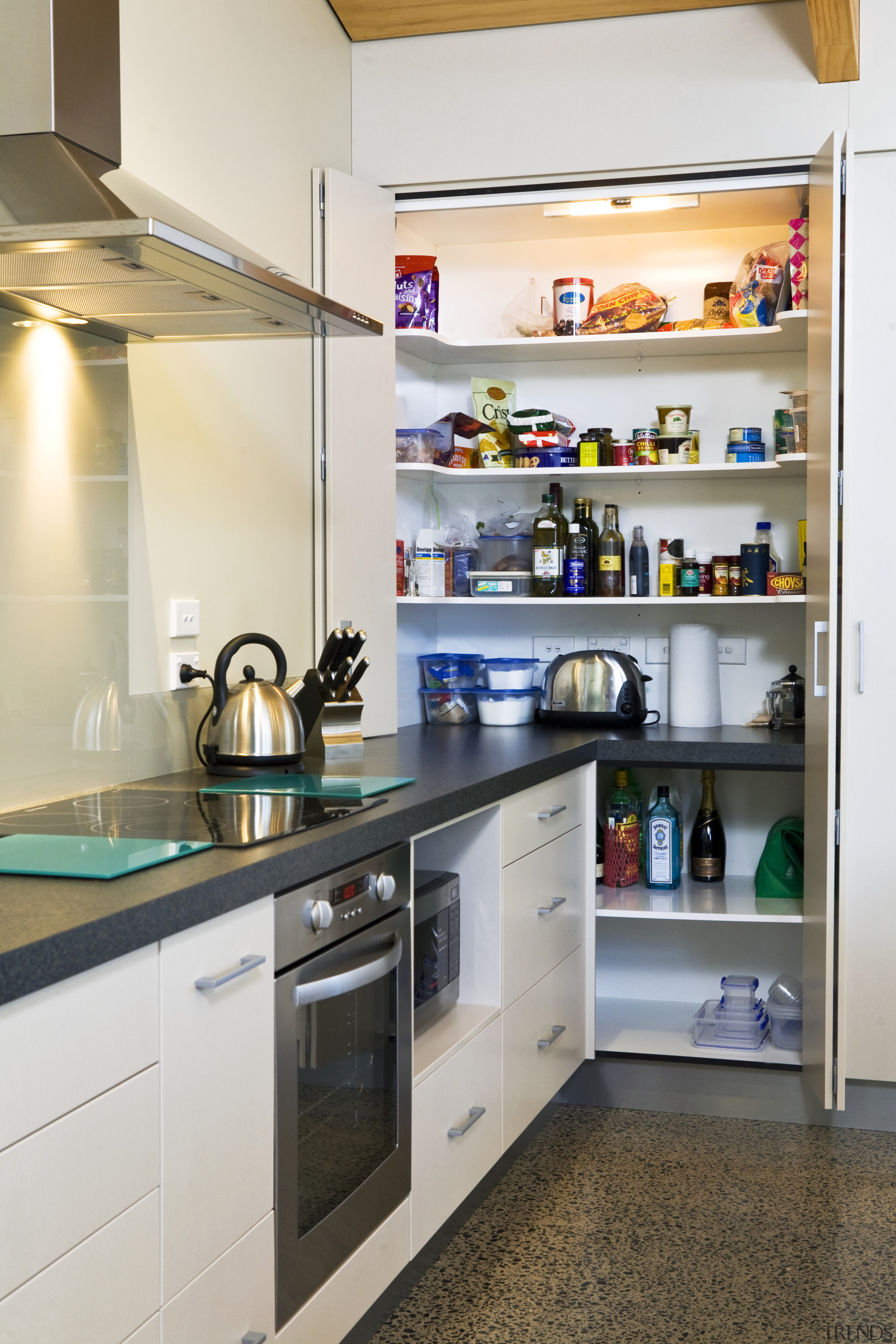 View of kitchen designed by Sheryl Stuart of cabinetry, countertop, home appliance, interior design, kitchen, major appliance, refrigerator, room, white