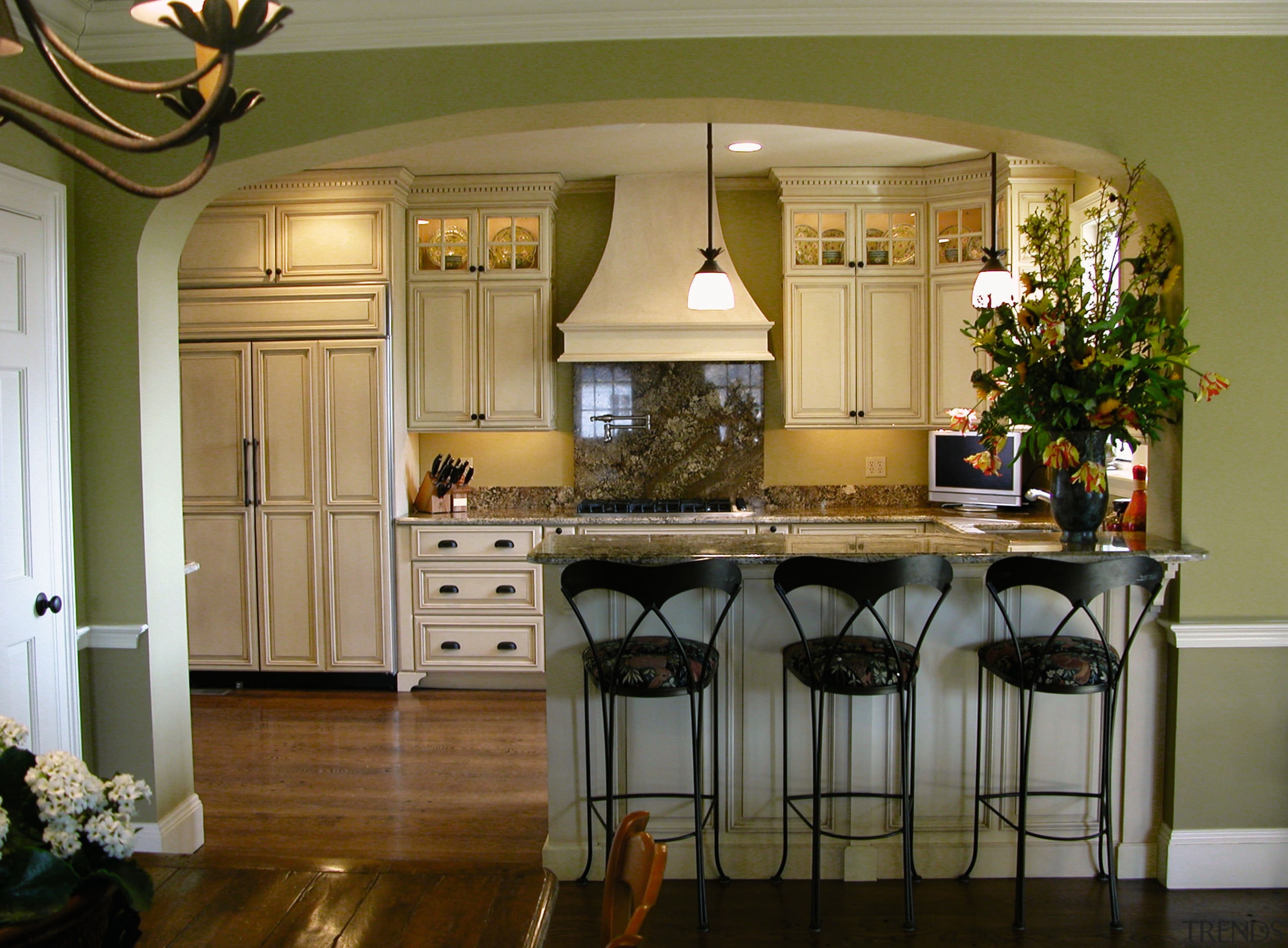 View of a kitchen, wooden flooring and cabinetry, cabinetry, countertop, cuisine classique, dining room, furniture, hardwood, home, interior design, kitchen, living room, room, window, brown