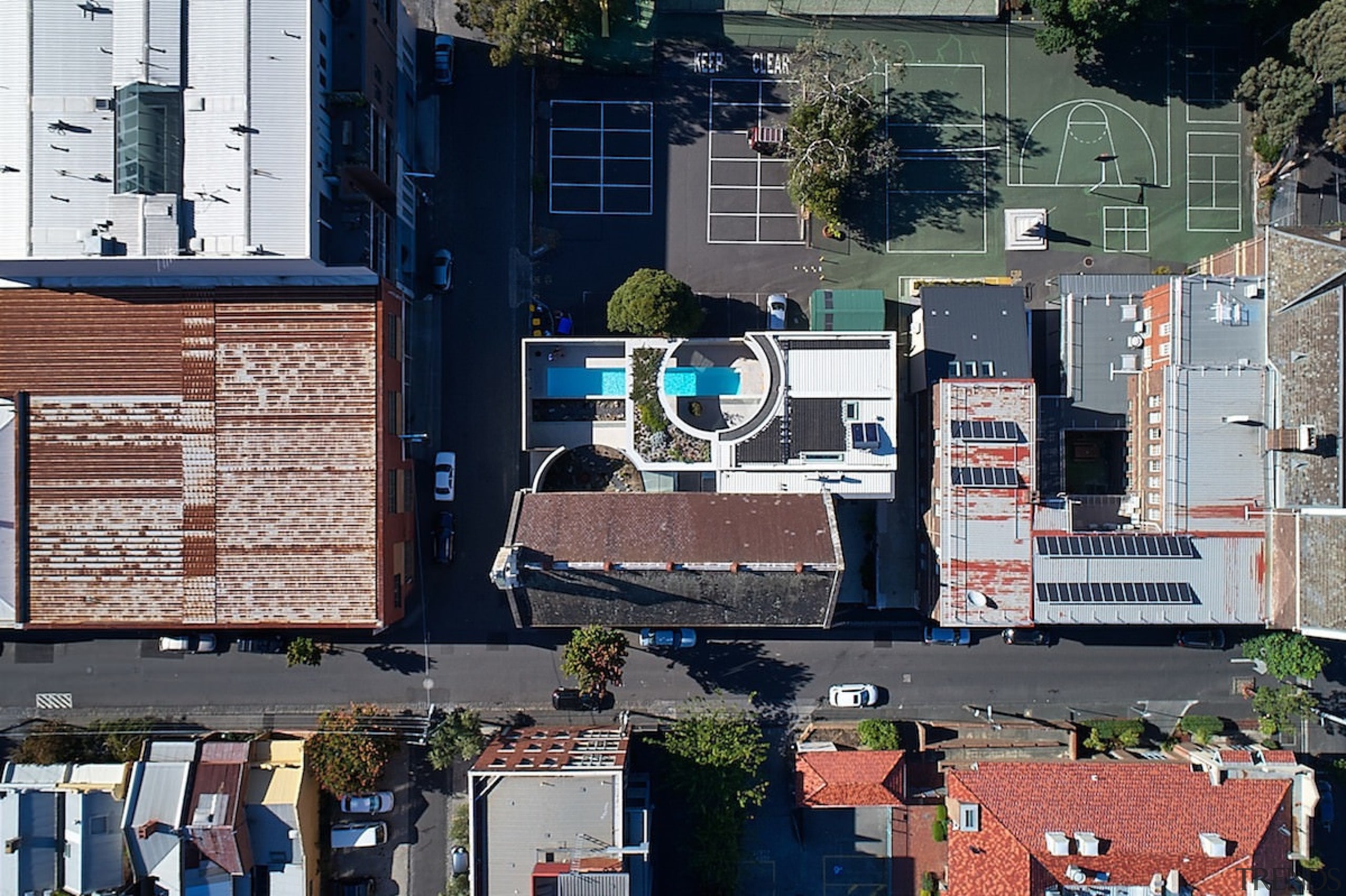 Looking down from above - Looking down from building, city, house, metropolis, metropolitan area, neighbourhood, residential area, roof, urban area, vehicle, gray