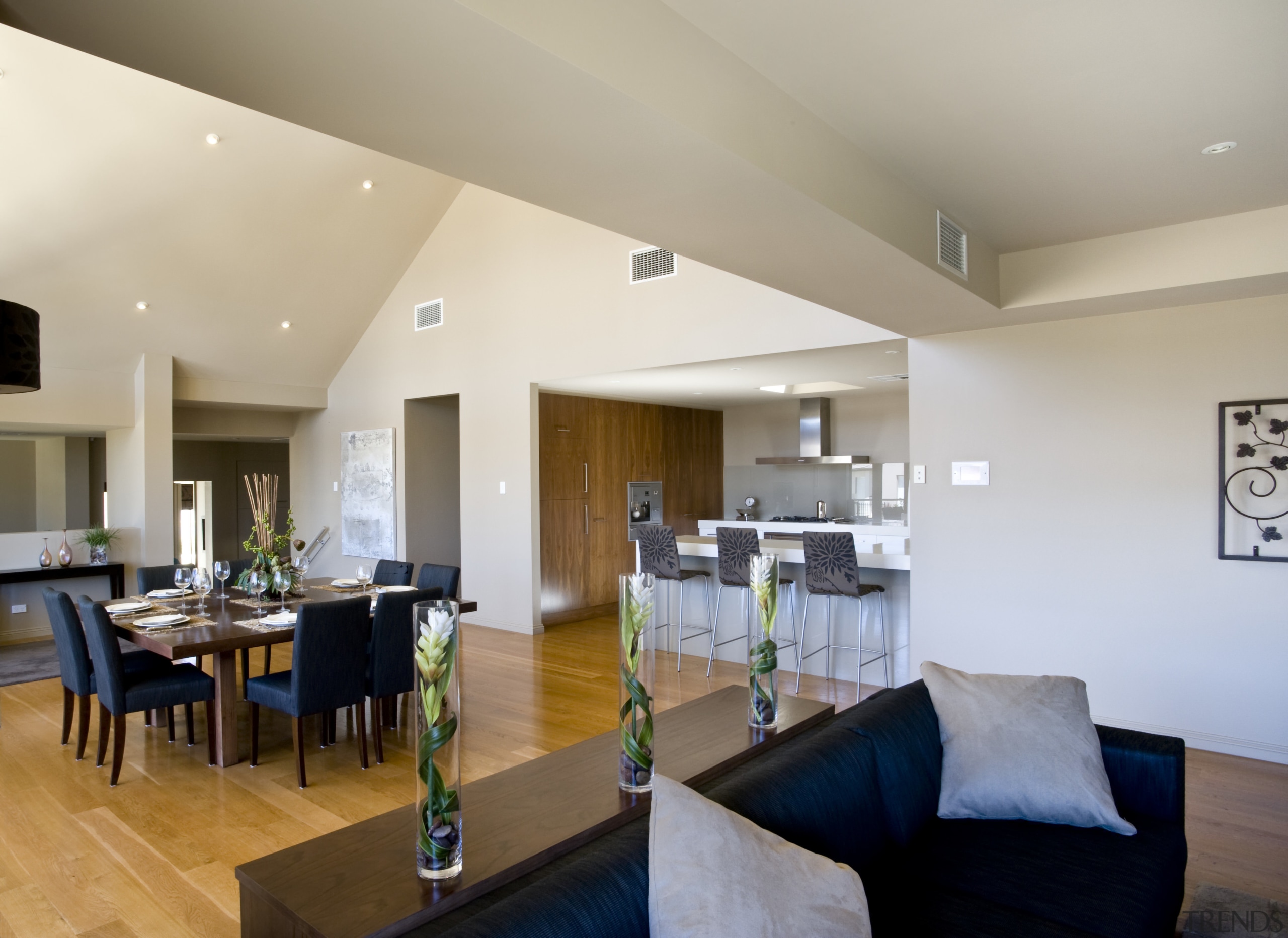 Image of the eating and living areas which apartment, ceiling, dining room, estate, floor, interior design, living room, penthouse apartment, property, real estate, room, gray