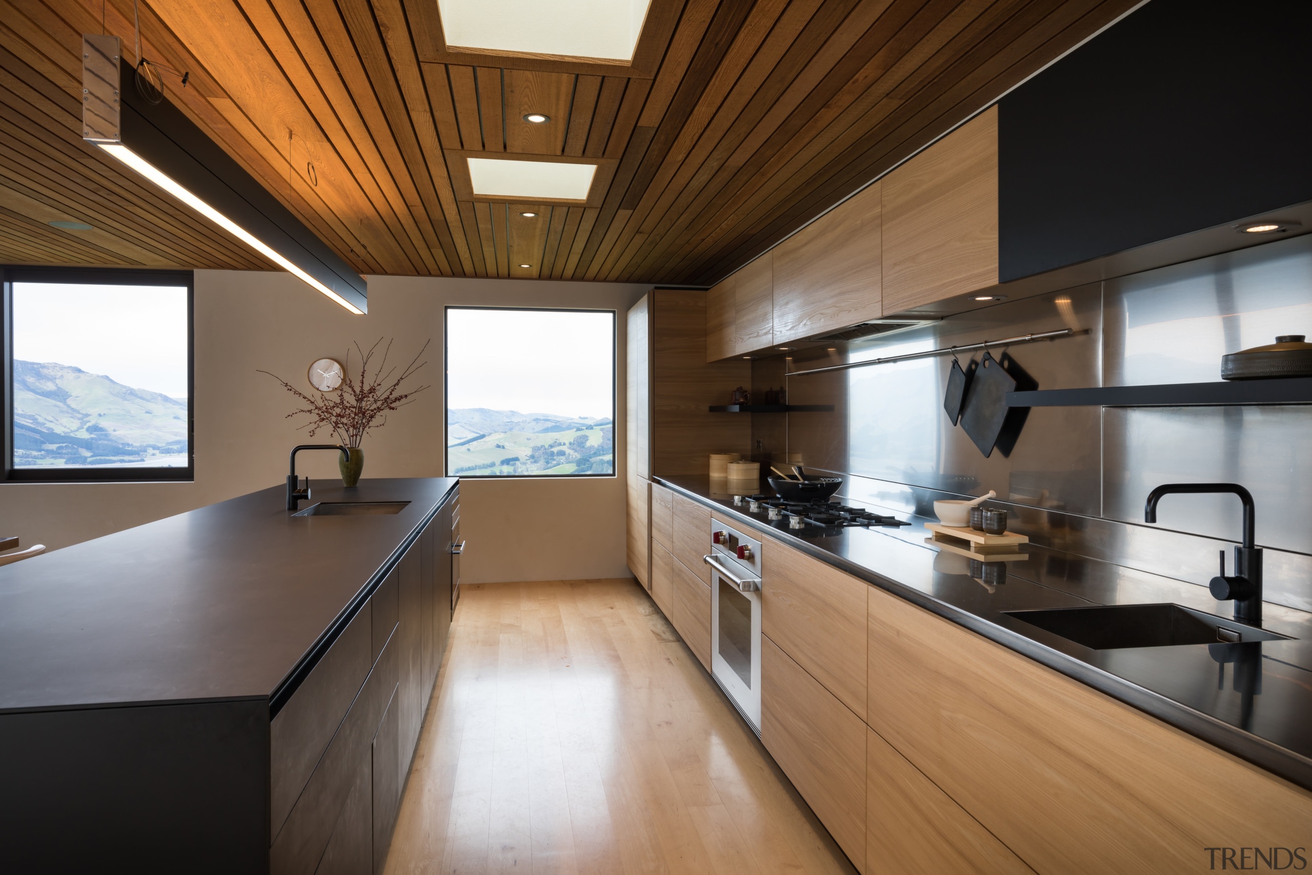 ​​​​​​​Recessed handles read as long lines, connecting to architecture, countertop, cuisine classique, house, interior design, kitchen, real estate, room, brown, sinks