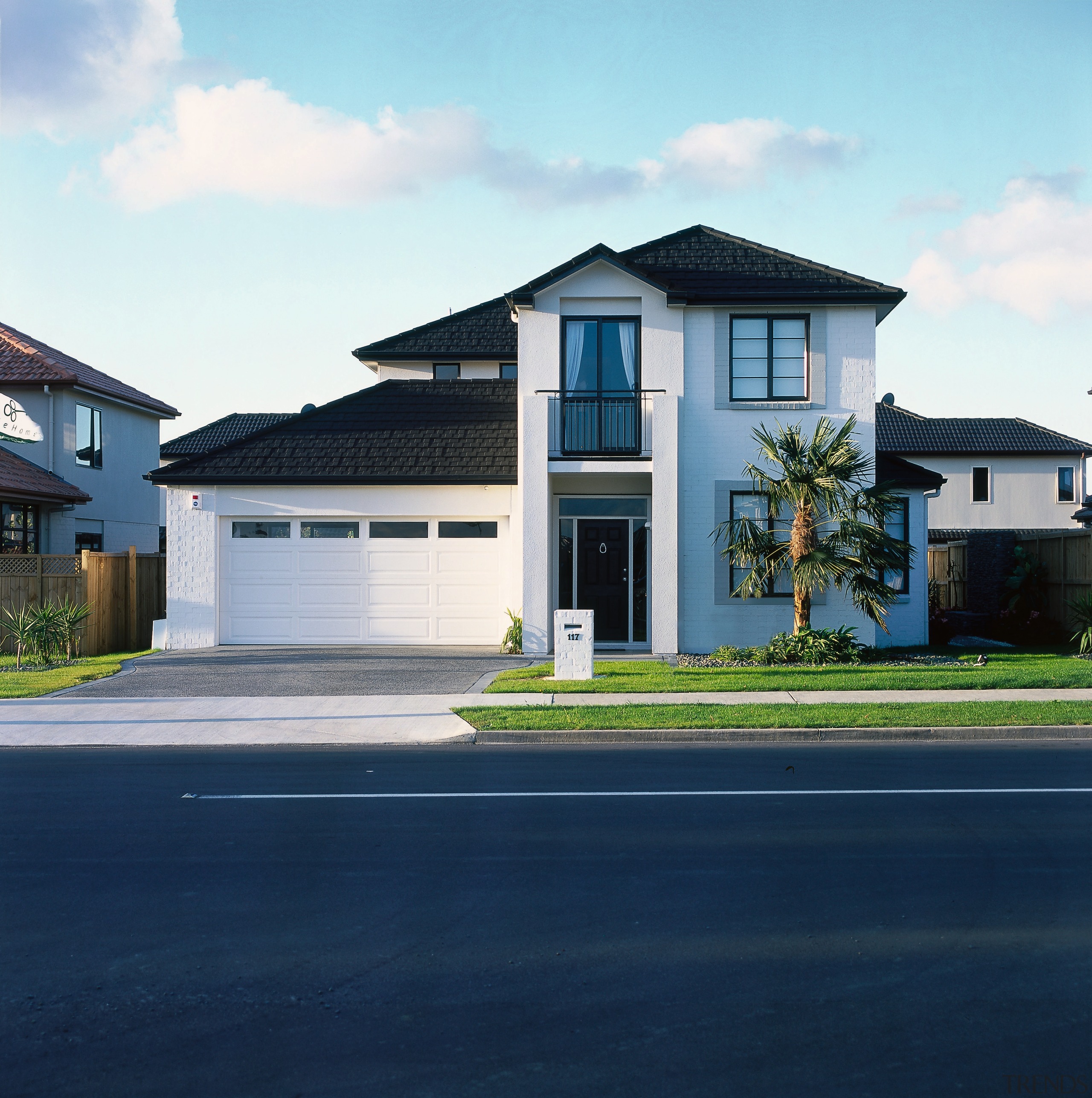 Frontal view of this double-storey home - Frontal architecture, asphalt, building, elevation, estate, facade, home, house, neighbourhood, property, real estate, residential area, roof, siding, sky, suburb, blue