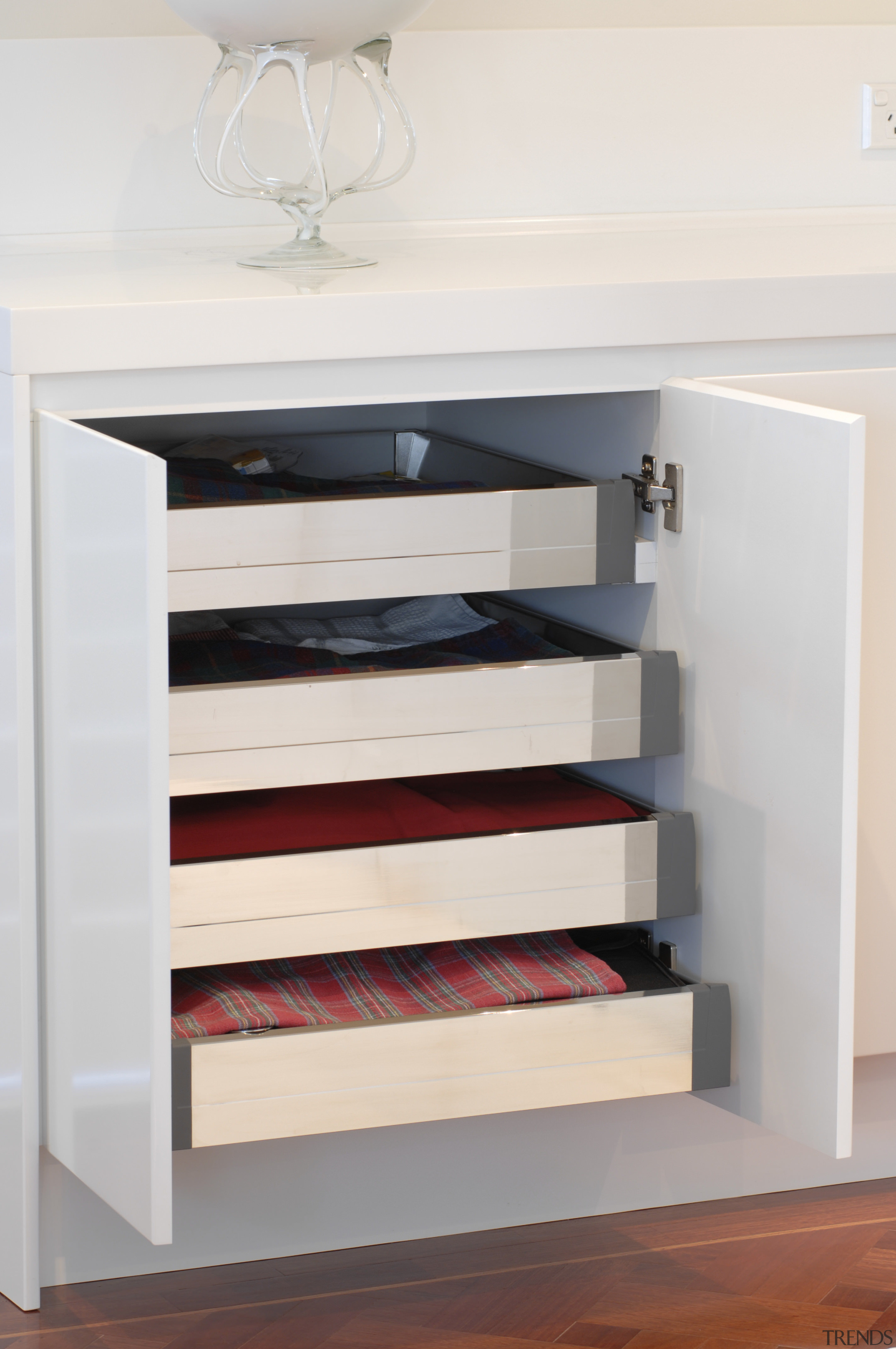 View of kitchen cabinetry with integrated draws. - chest of drawers, drawer, furniture, product, product design, shelf, shelving, white