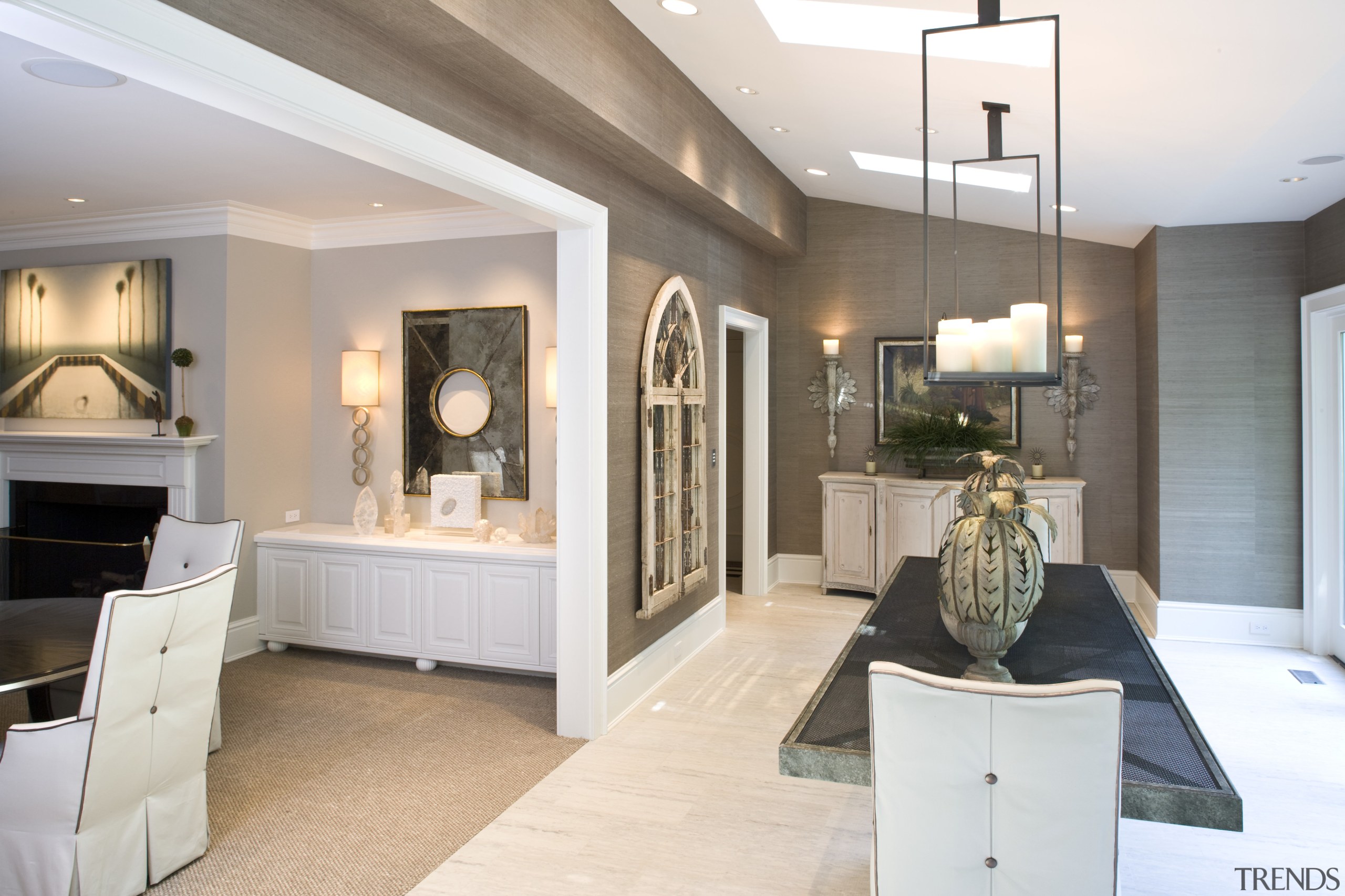 Image of the dining room. The room features ceiling, floor, flooring, home, interior design, living room, room, white