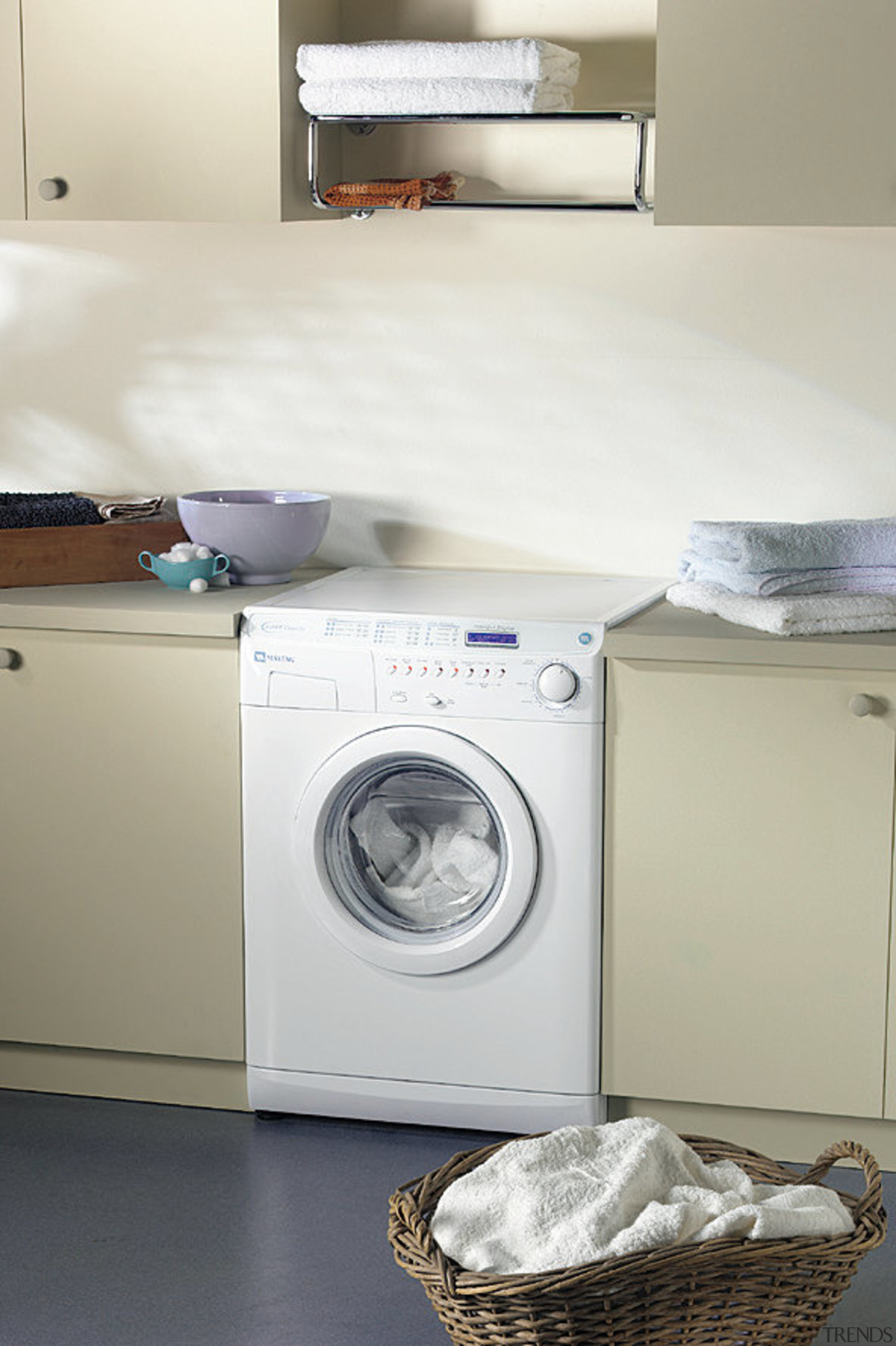 Laundry with white front loading washing machine, and clothes dryer, home appliance, laundry, laundry room, major appliance, product design, room, washing machine, gray, white