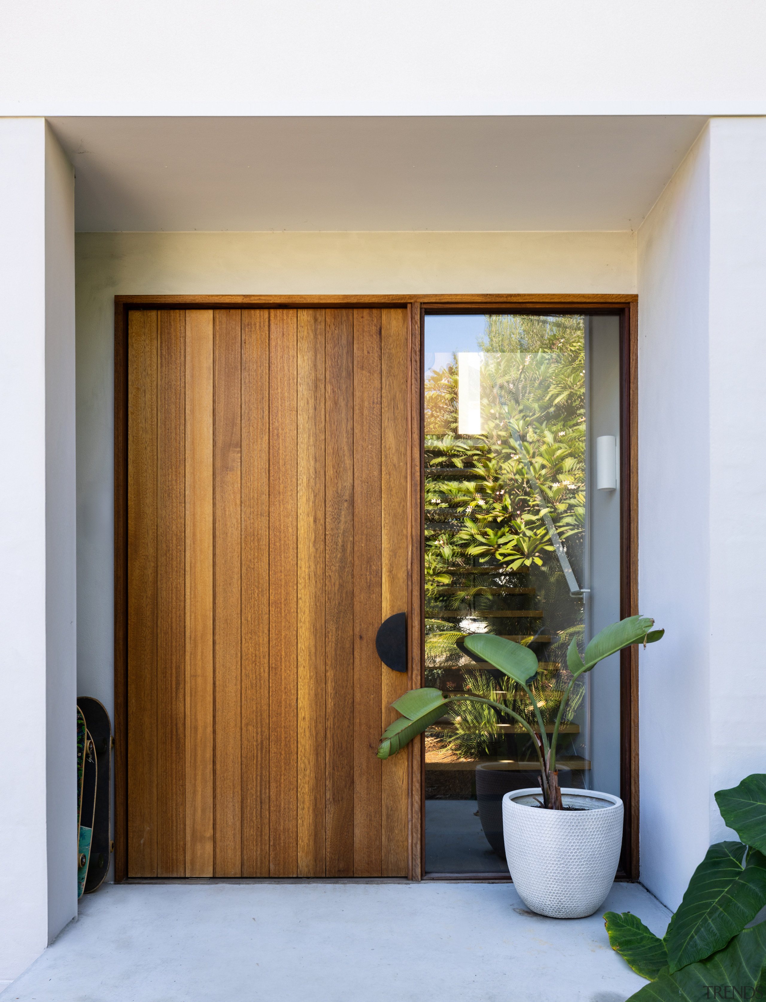 Front door offers a warm wood welcome. - 