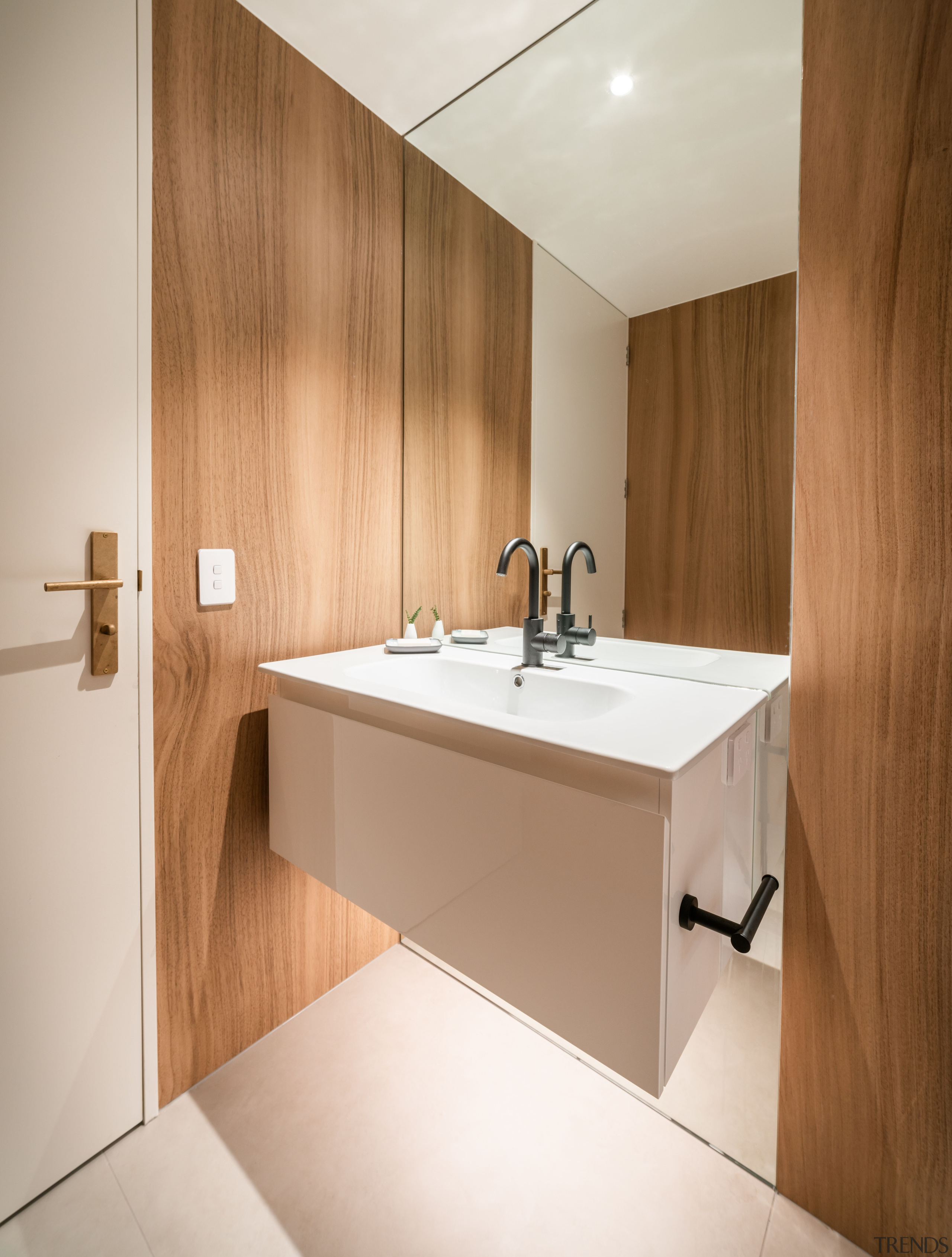 The floating vanity adds to this bathroom's sense 